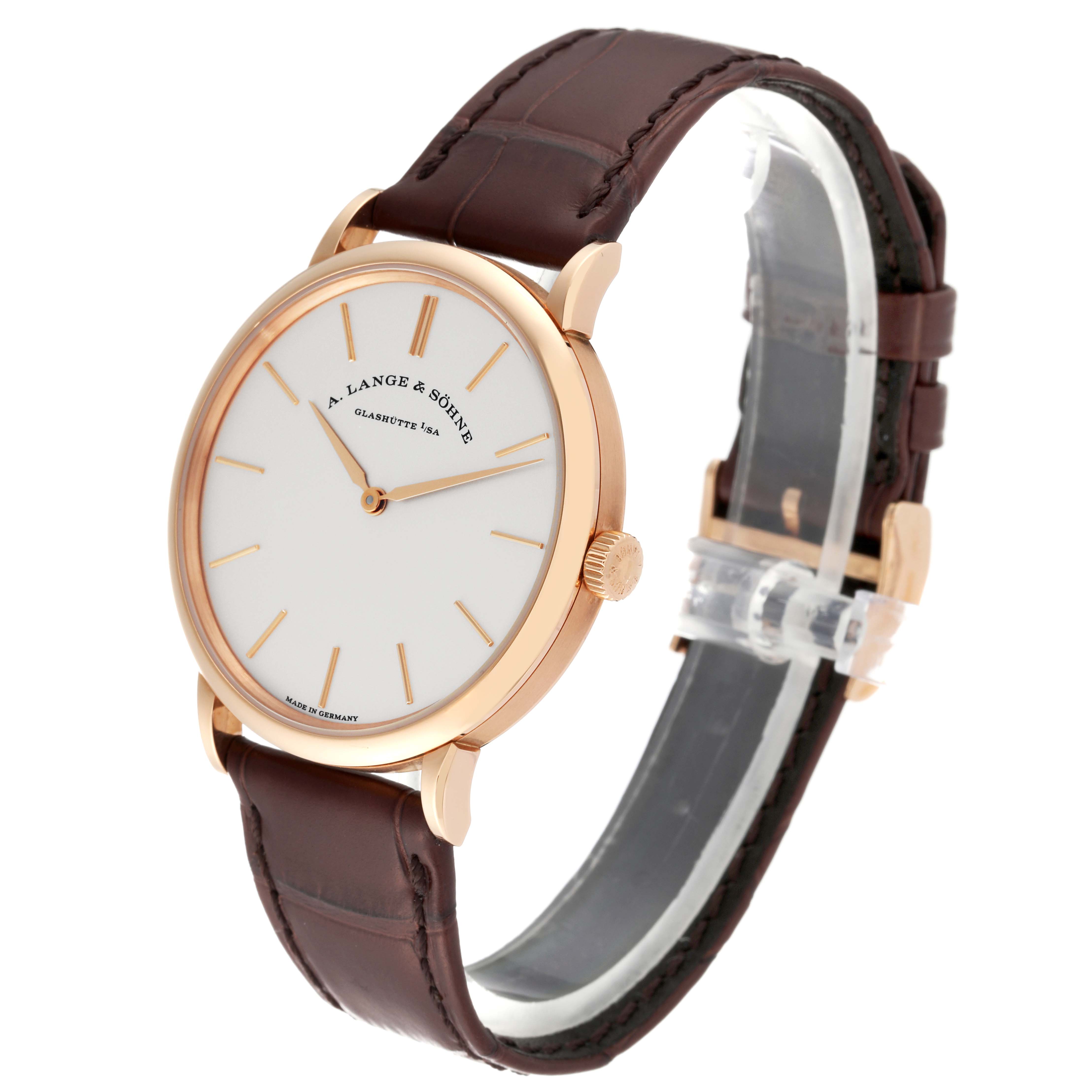 The A. Lange 
Sohne Saxonia 201.033 Men
s Rose Gold Silver Dial watch is shown at a three-quarter angle, featuring its white dial, gold case, crown, and brown leather strap.