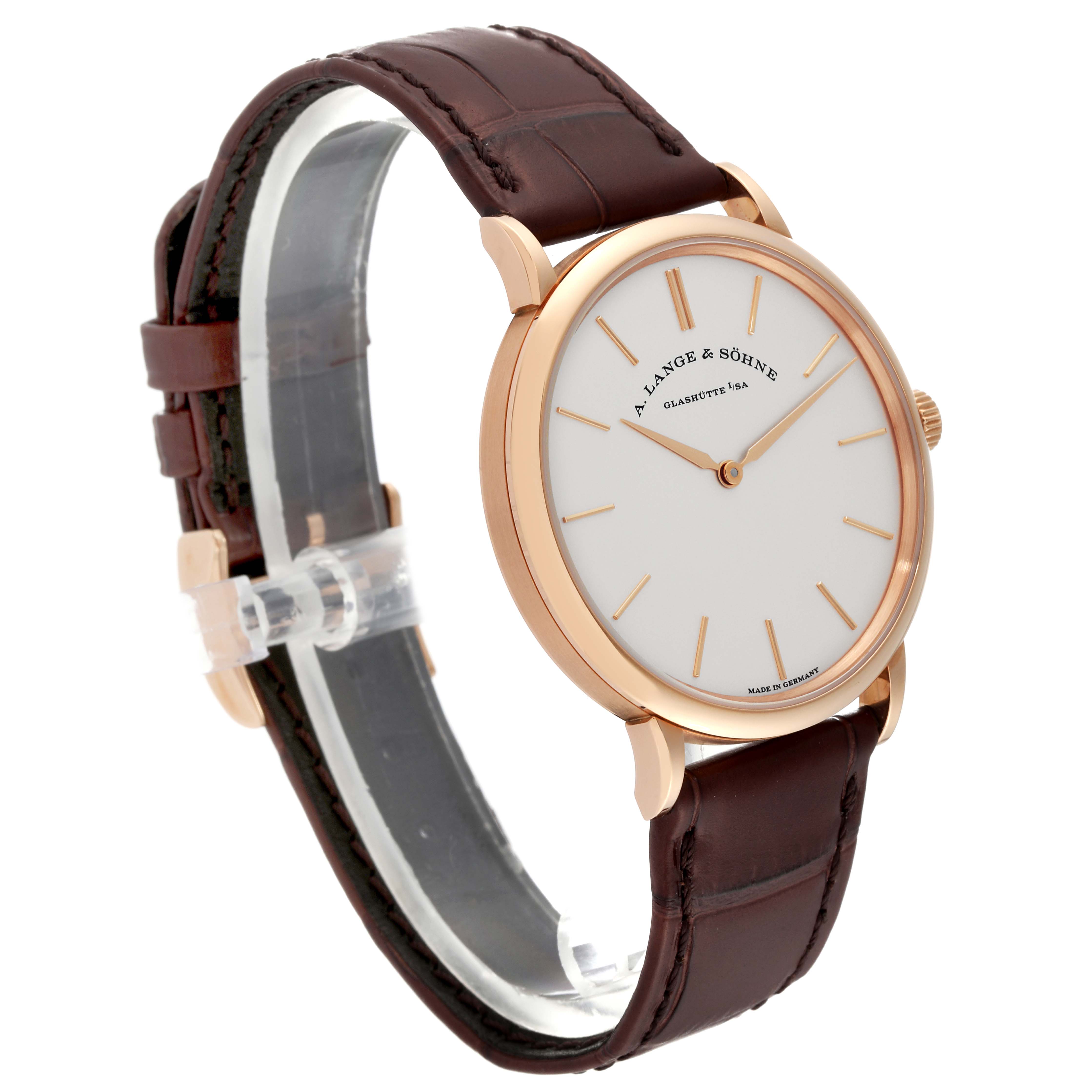 The image shows a side angle view of the A. Lange 
Sohne Saxonia 201.033 Men
s Rose Gold Silver Dial watch, highlighting its face, case, and leather strap.