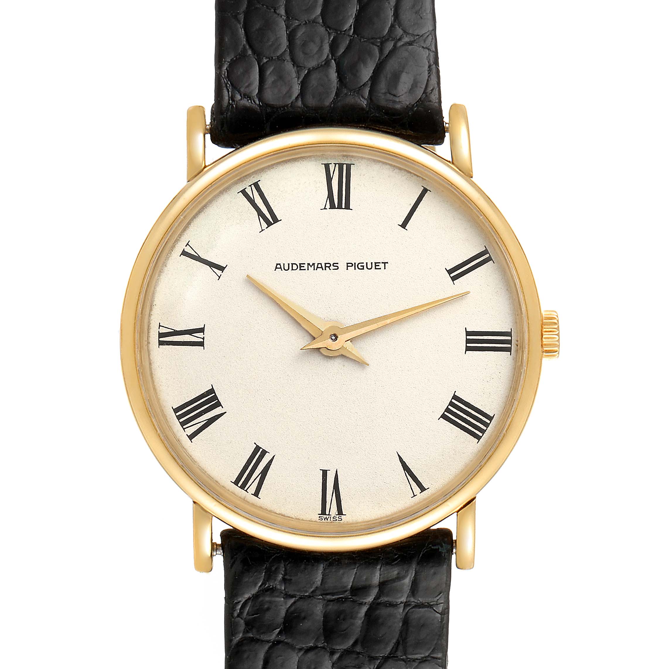 This image shows a front view of a Vintage Audemars Piguet watch with a gold case, white dial, Roman numerals, and a black leather strap.