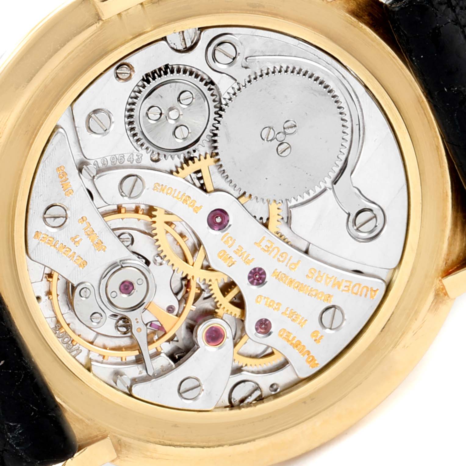 The image shows the intricate movement and inner mechanisms of a Vintage Audemars Piguet watch from a back view.