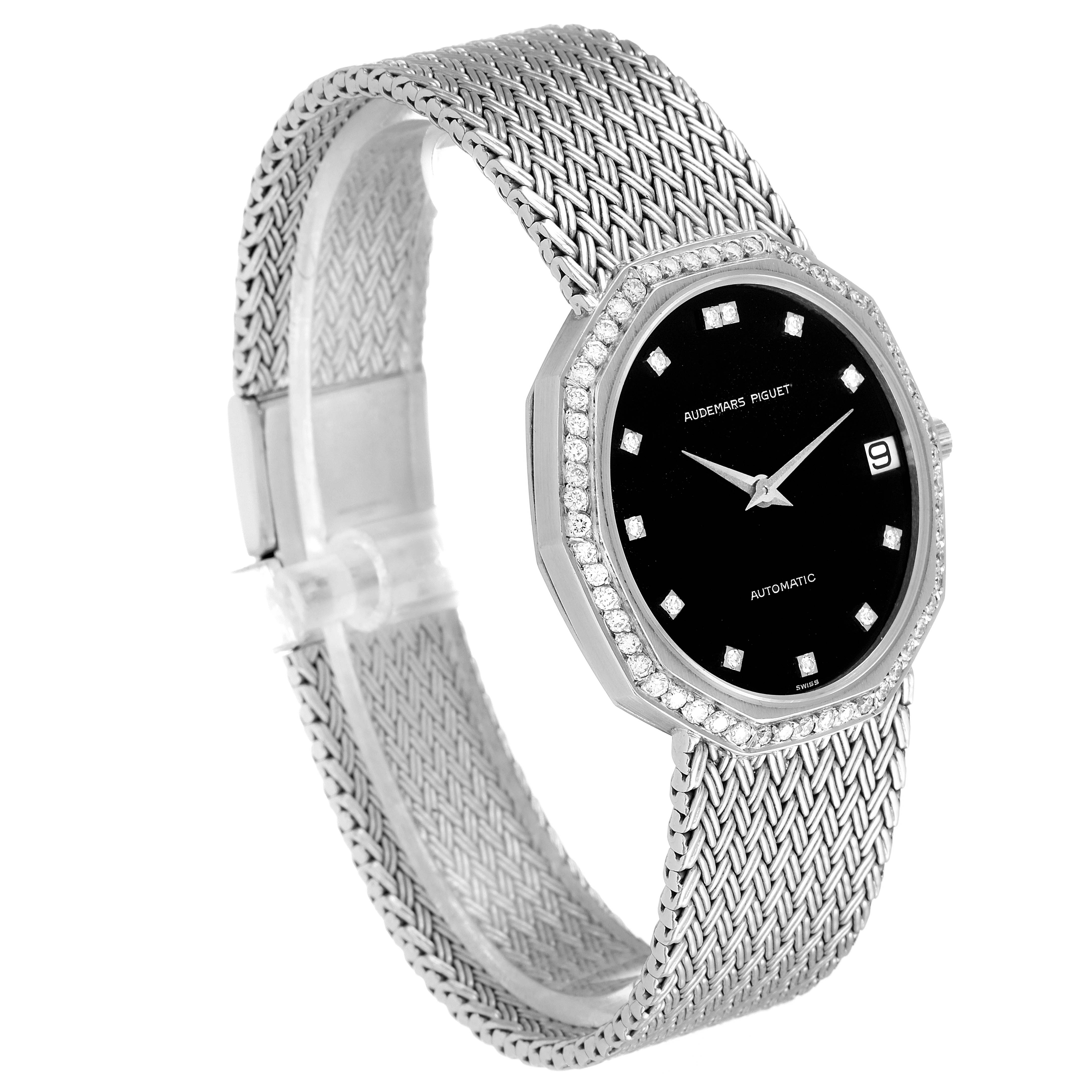 This image shows a side angle of a vintage Audemars Piguet watch, featuring its mesh bracelet, black dial, and octagonal diamond-set bezel.