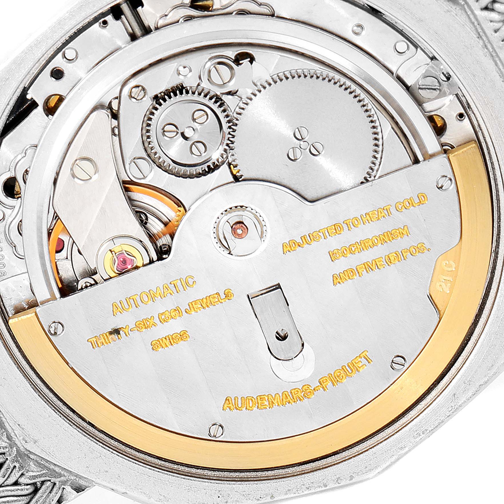 Close-up shot of the movement and inner mechanism of a Vintage Audemars Piguet watch.