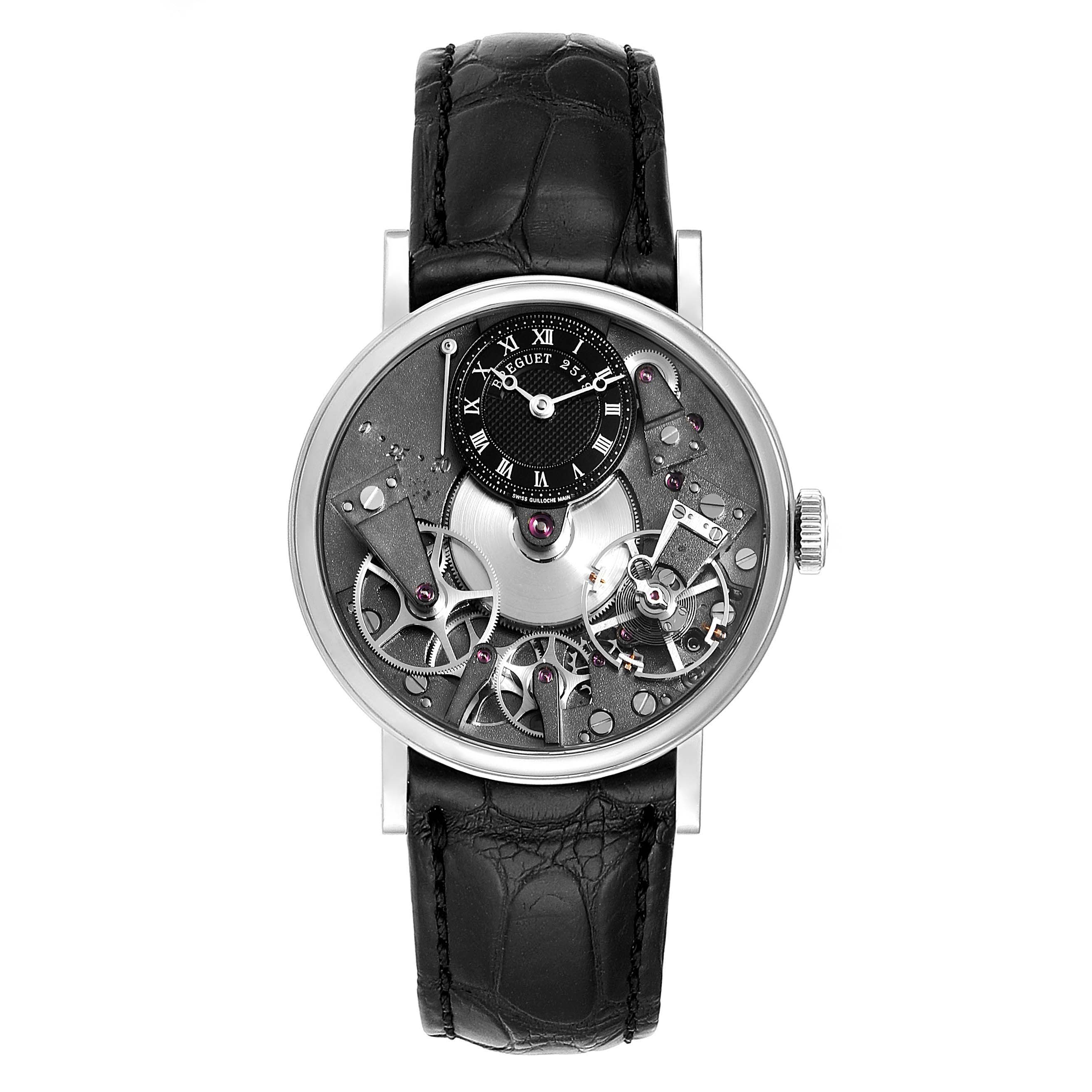 This image shows a front view of the Breguet Tradition 7027BB/G9/9V6 Men's White Gold Transparent Dial 7027BB/G9/9V6 Men's White Gold Transparent Dial model watch displaying its open-worked dial, visible gears, and black strap.