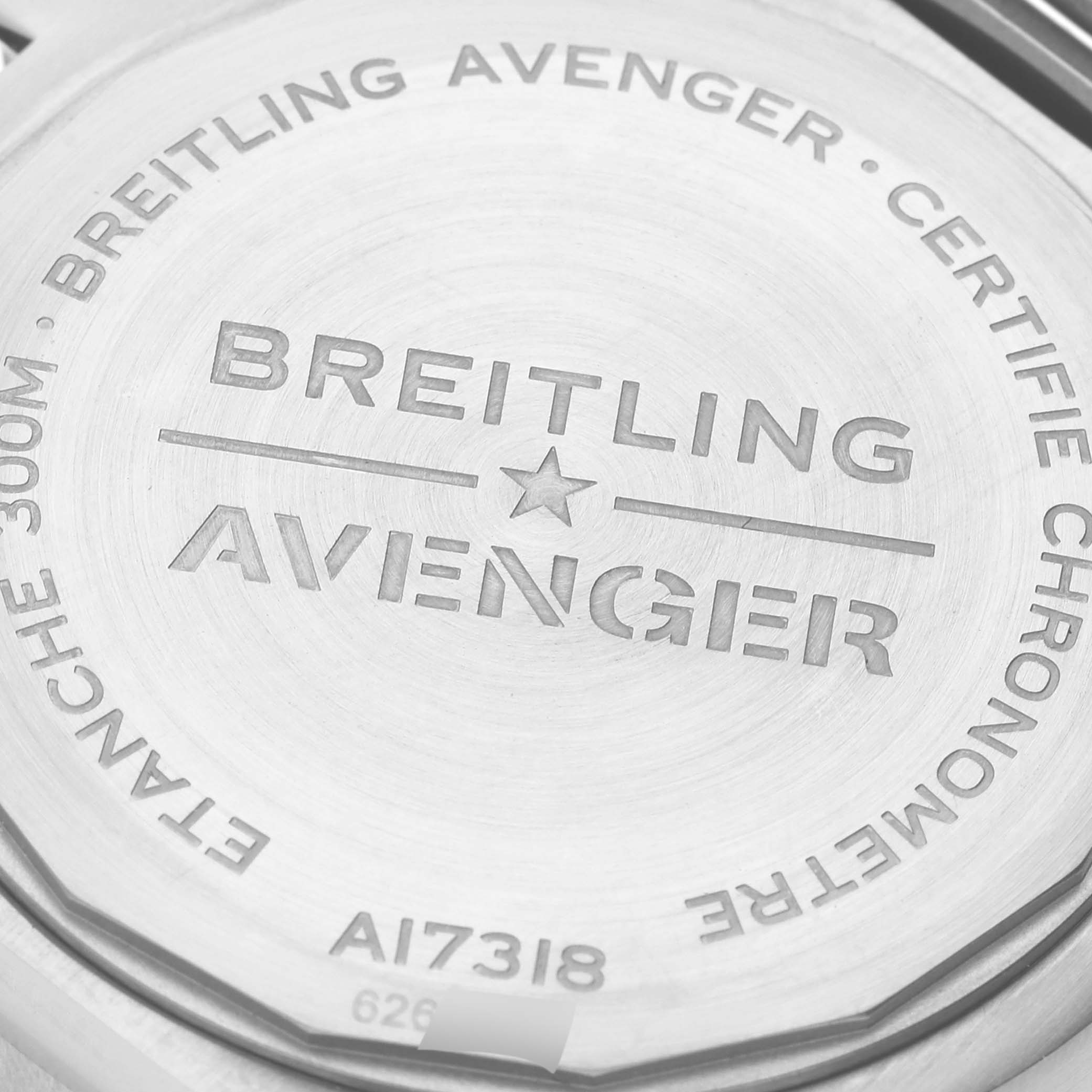 The image shows the back case of a Breitling Avenger A17318101B1A1 Men's Stainless Steel Black Dial A17318101B1A1 Men's Stainless Steel Black Dial watch, displaying model details and specifications.