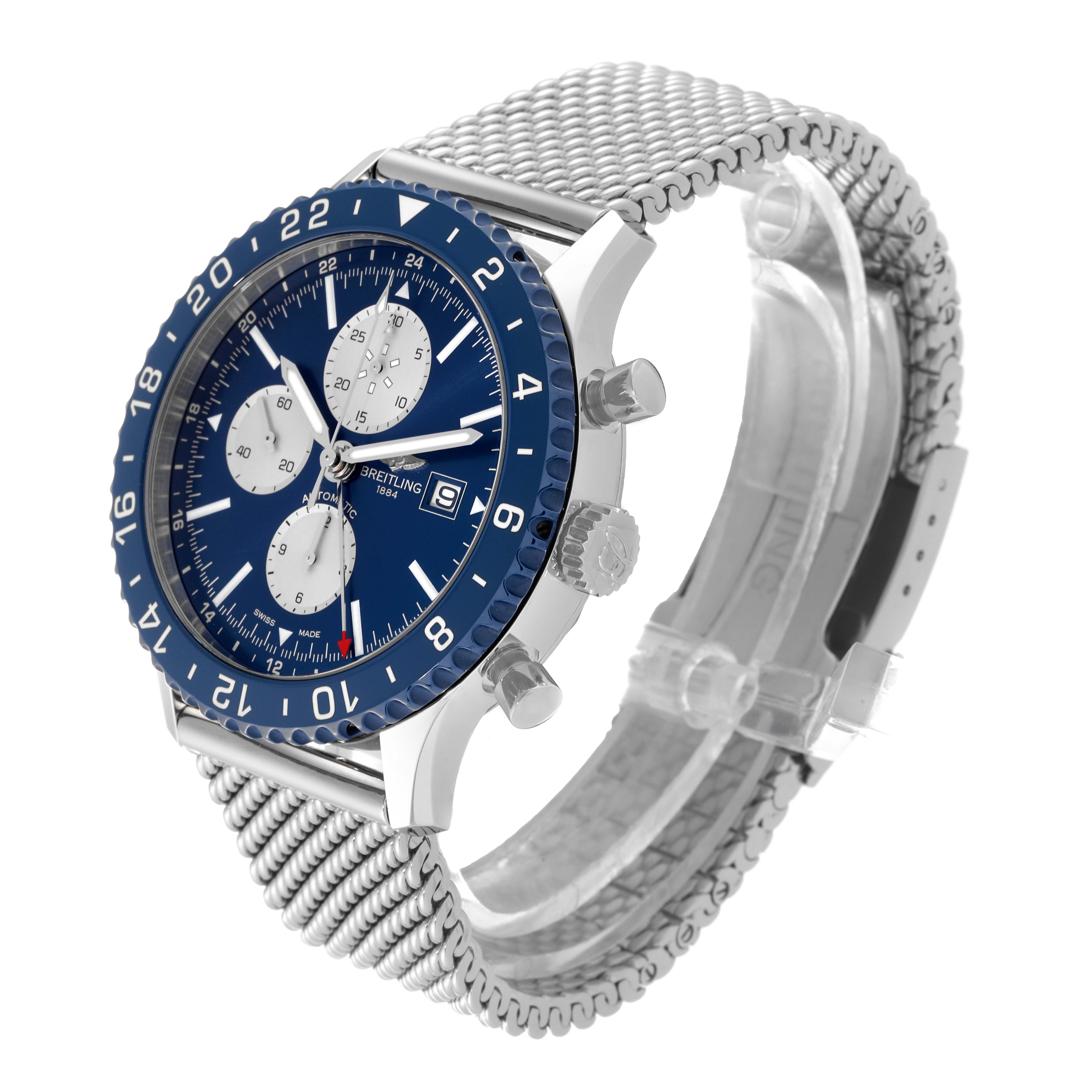 The image shows a Breitling Chronoliner Y243106/C970 Men's Stainless Steel Blue Dial Y243106/C970 Men's Stainless Steel Blue Dial watch at a three-quarter angle, highlighting its blue dial, bezel, and mesh strap.