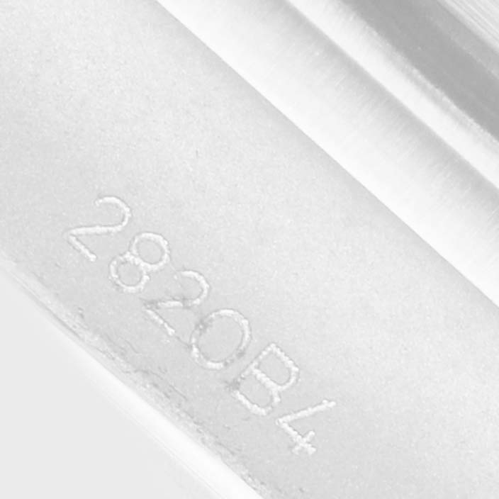 The image shows a close-up of the Breitling Chronomat AB0134 Men's Stainless Steel Blue Dial model's engraved serial number.