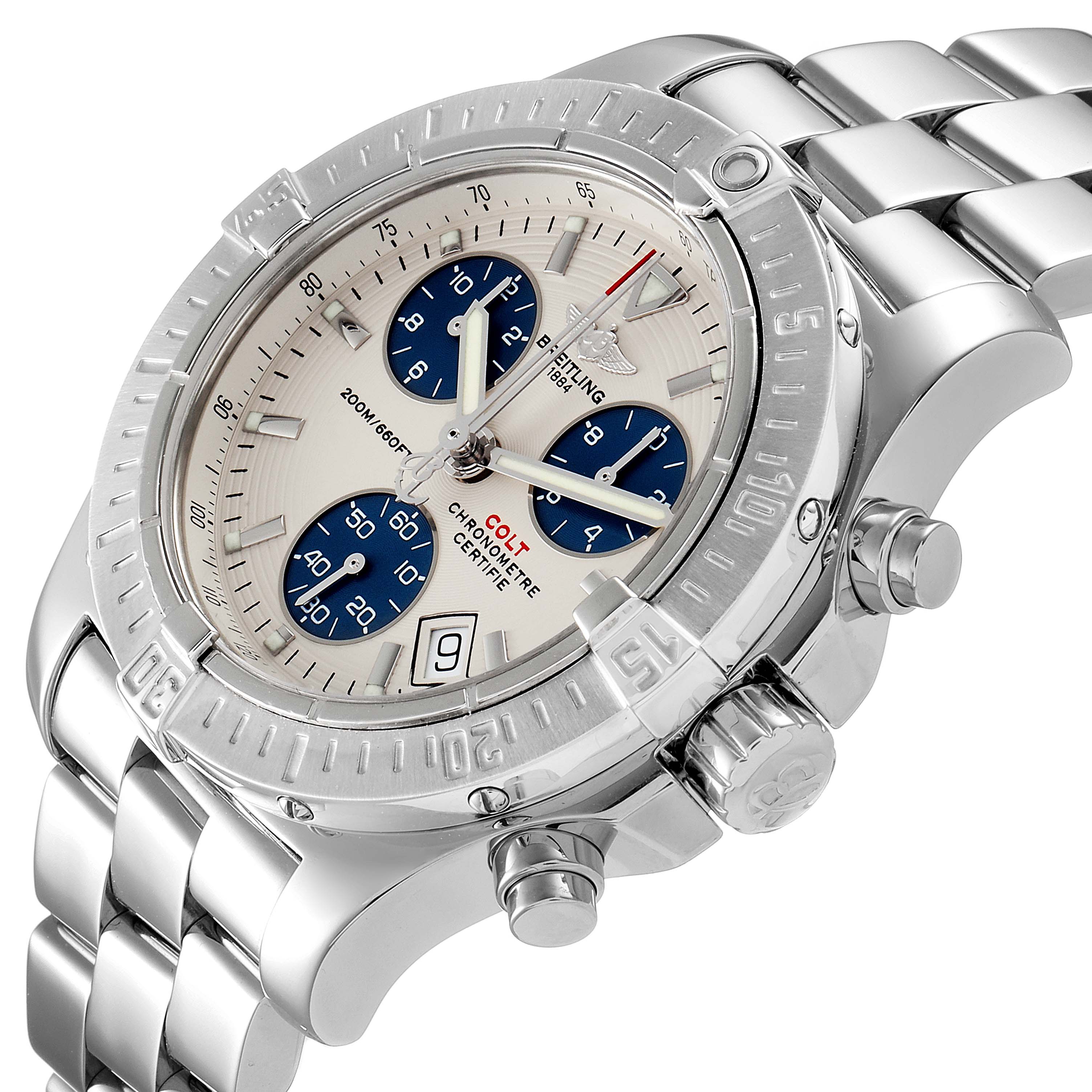 The image shows a Breitling Colt A73380 Men
s Stainless Steel White Dial A73380 Men
s Stainless Steel White Dial watch at a three-quarter angle highlighting the face, bezel, crown, and part of the metal bracelet.