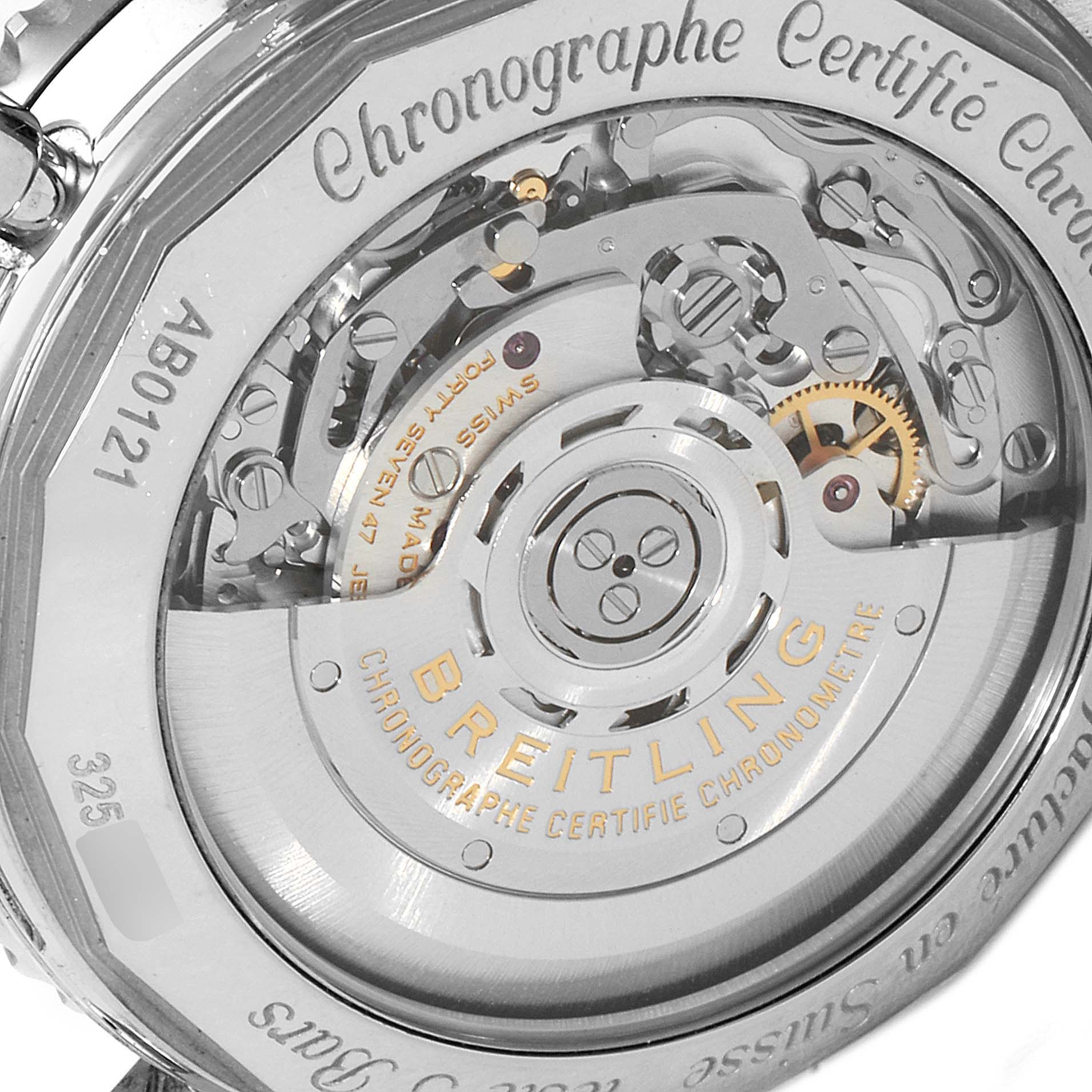 The image shows the backside of a Breitling Navitimer AB0121 Men
s Stainless Steel Black Dial AB0121 Men
s Stainless Steel Black Dial watch, highlighting its exposed movement and internal mechanisms.