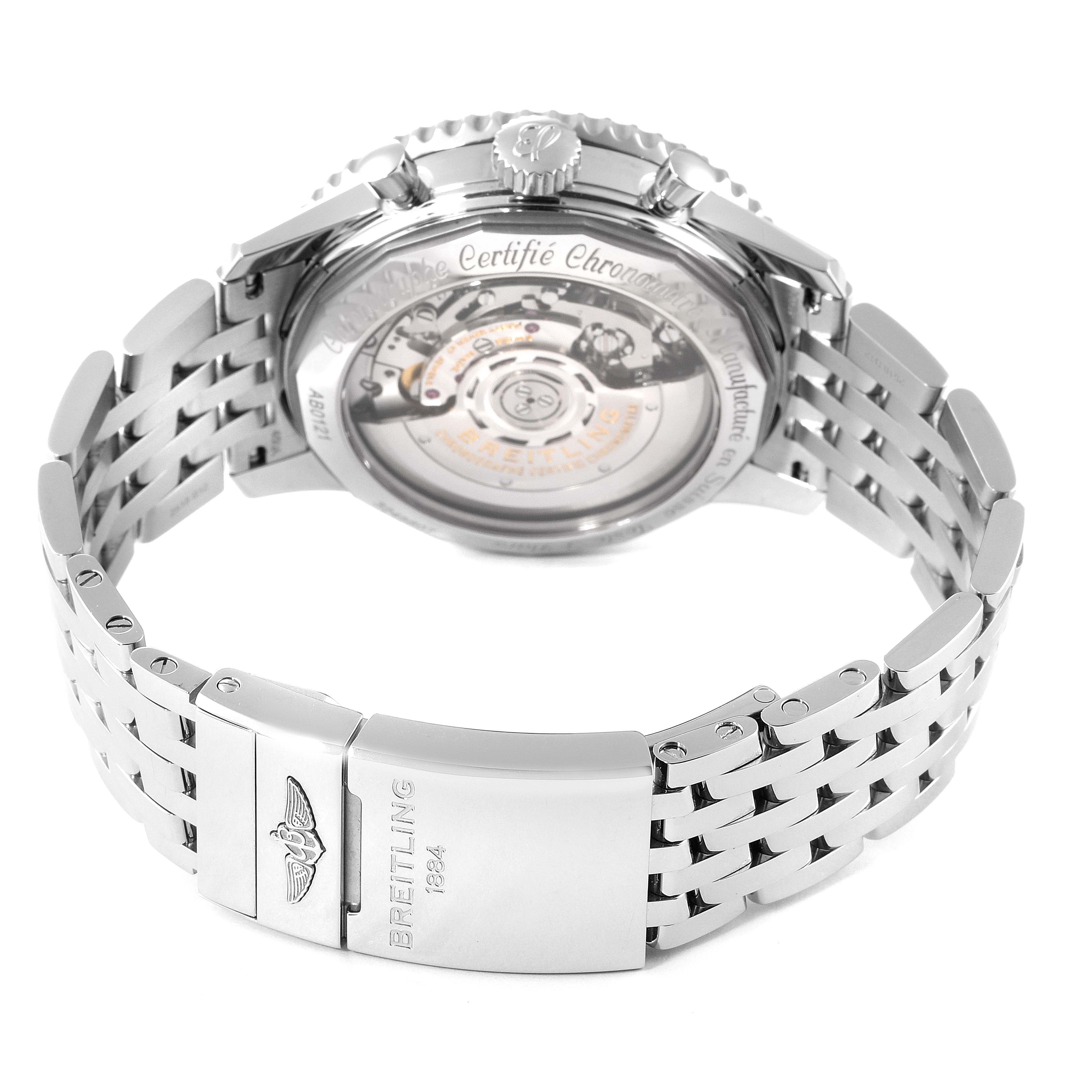 The image shows the back view of a Breitling Navitimer AB0121 Men's Stainless Steel Silver Dial AB0121 Men's Stainless Steel Silver Dial watch, highlighting the movement through the transparent case back and the metal bracelet.