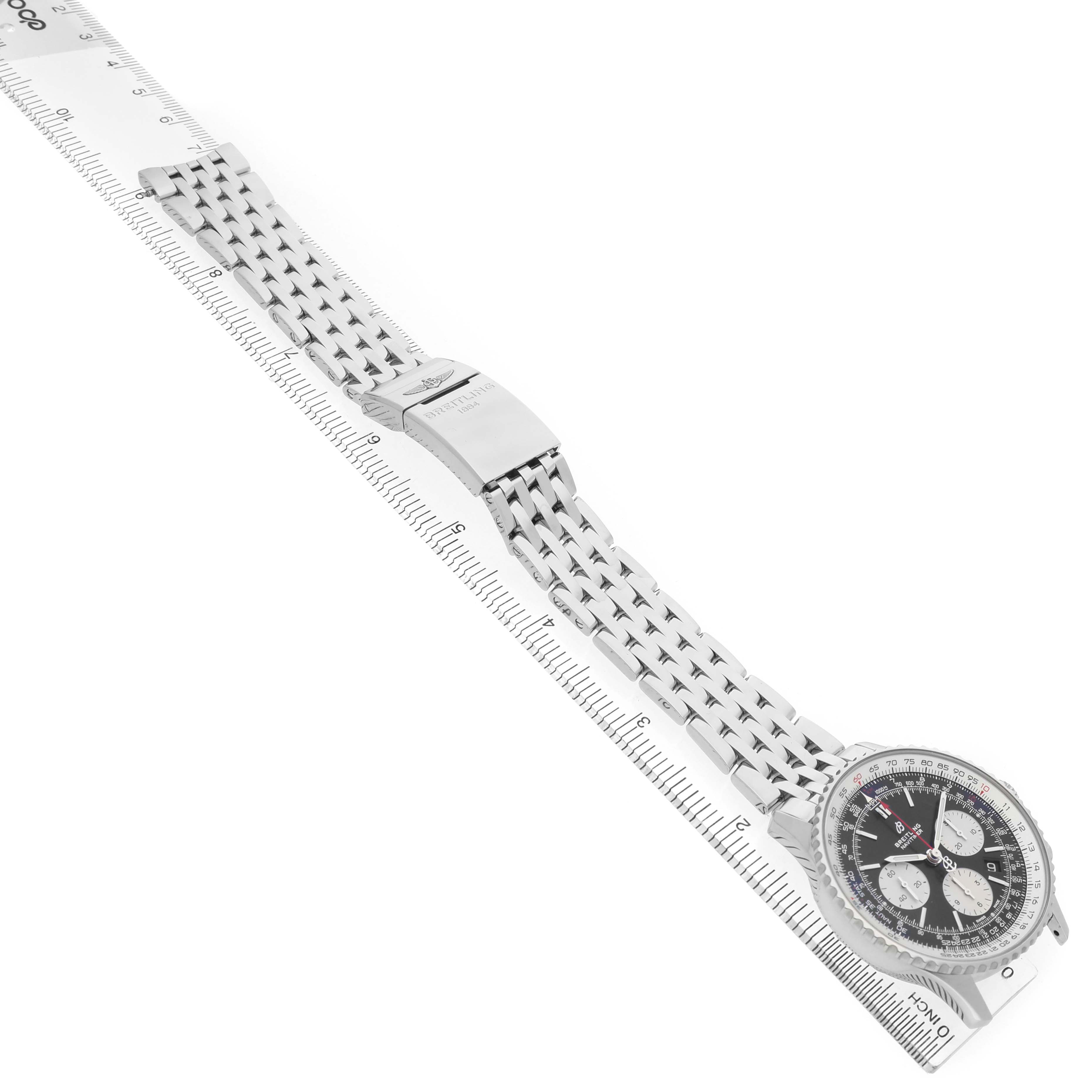 The Breitling Navitimer AB0121 Men's Stainless Steel Black Dial watch is shown from a diagonal top view, displaying the face, bezel, bracelet, and clasp.