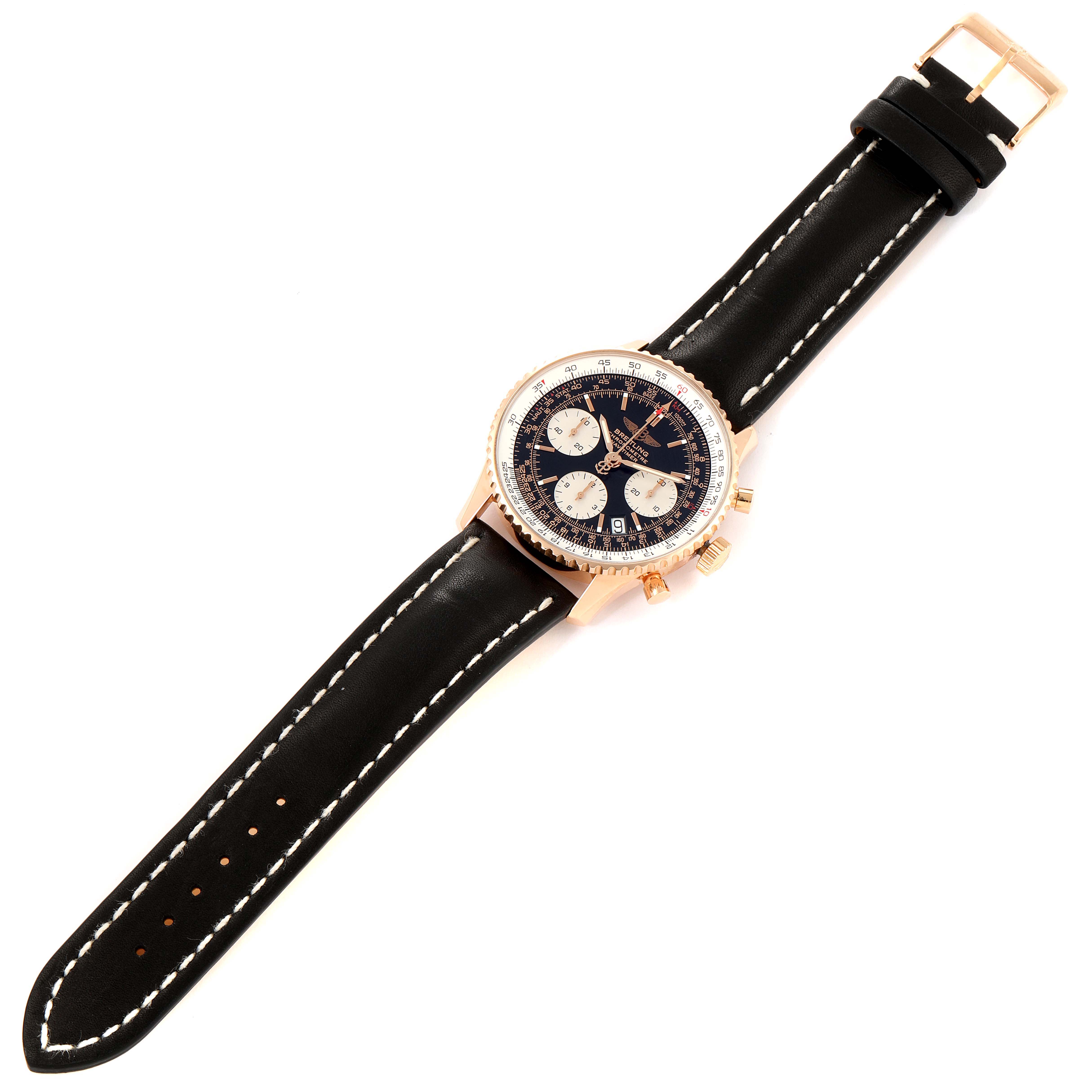The image shows a top-down view of the Breitling Navitimer R23322 Men's Rose Gold Black Dial R23322 Men's Rose Gold Black Dial watch with its face, black leather strap, and buckle visible.