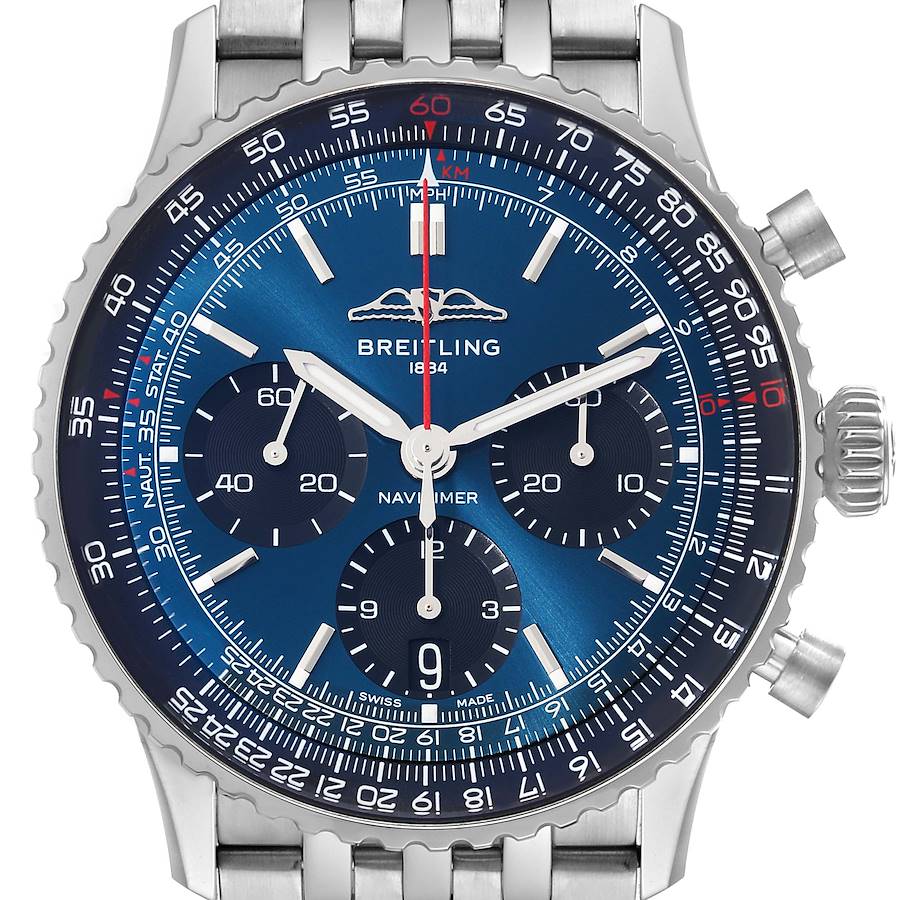 The watch is a Breitling Navitimer shown from the front, displaying its blue dial, bezel, subdials, and bracelet partially.