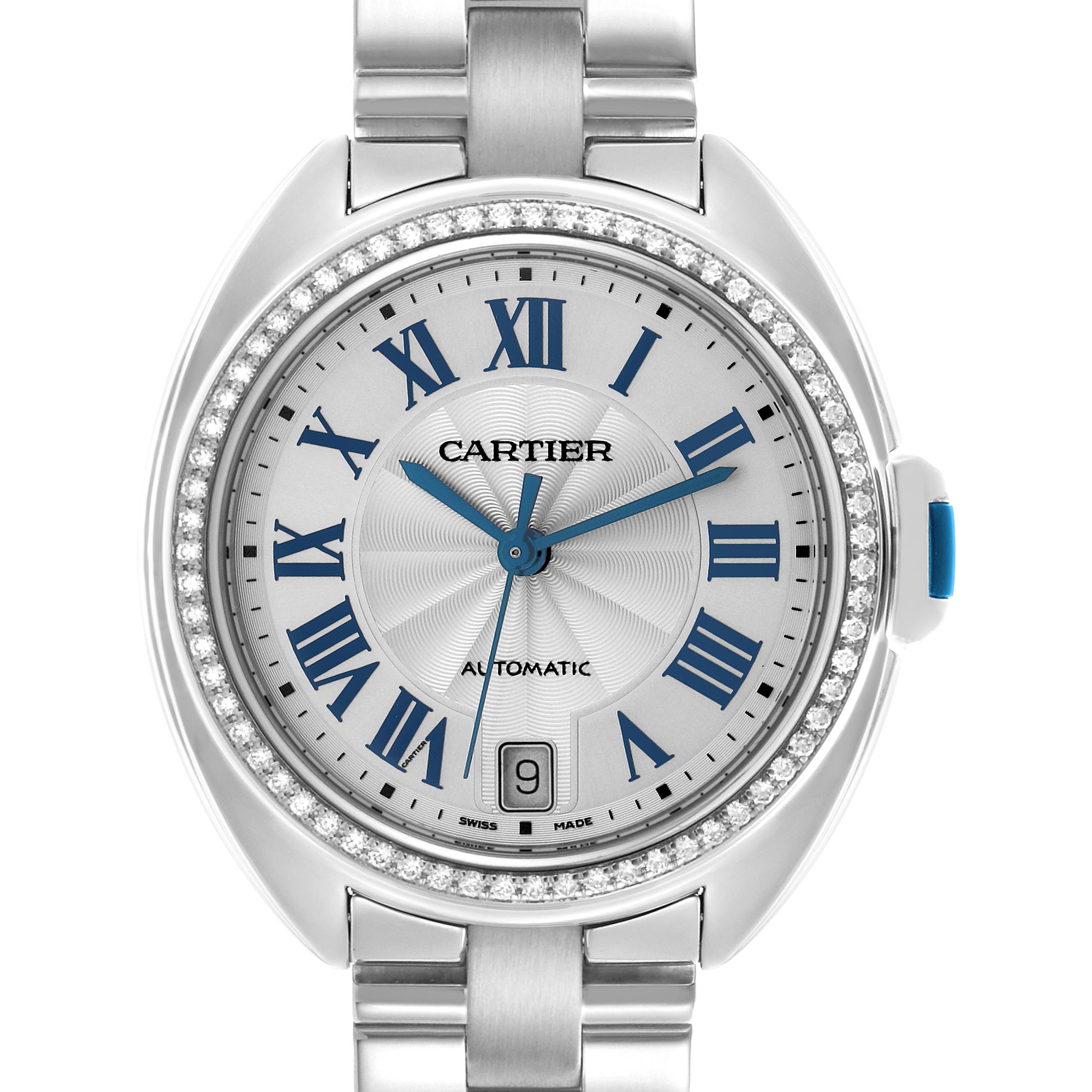 The Cartier Clé watch is shown from a front angle, displaying the dial, bezel, crown, and bracelet links.
