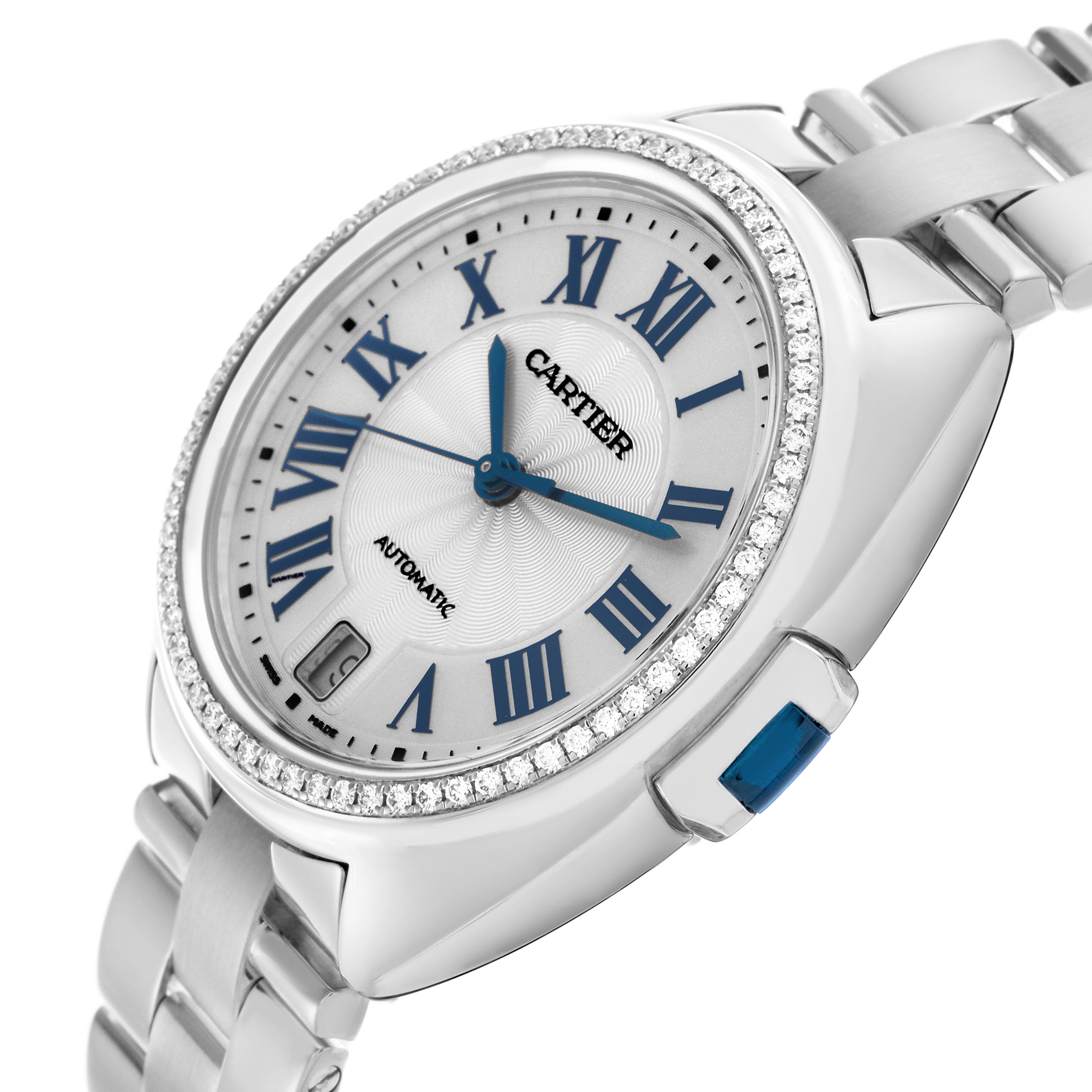 The watch is a Cartier Clé model shown at a slight angle, highlighting the face, Roman numerals, date window, and bracelet.