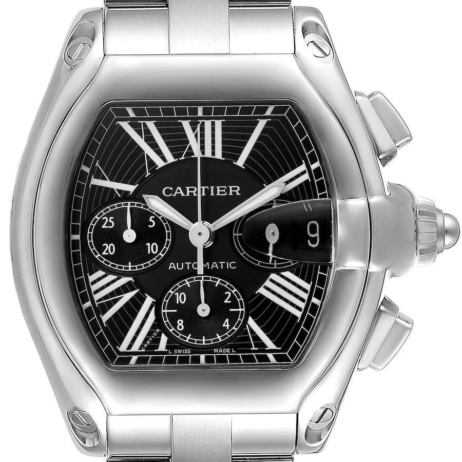 The Cartier Roadster watch is shown from a front angle, highlighting its black dial, Roman numerals, chrono dials, and crown.