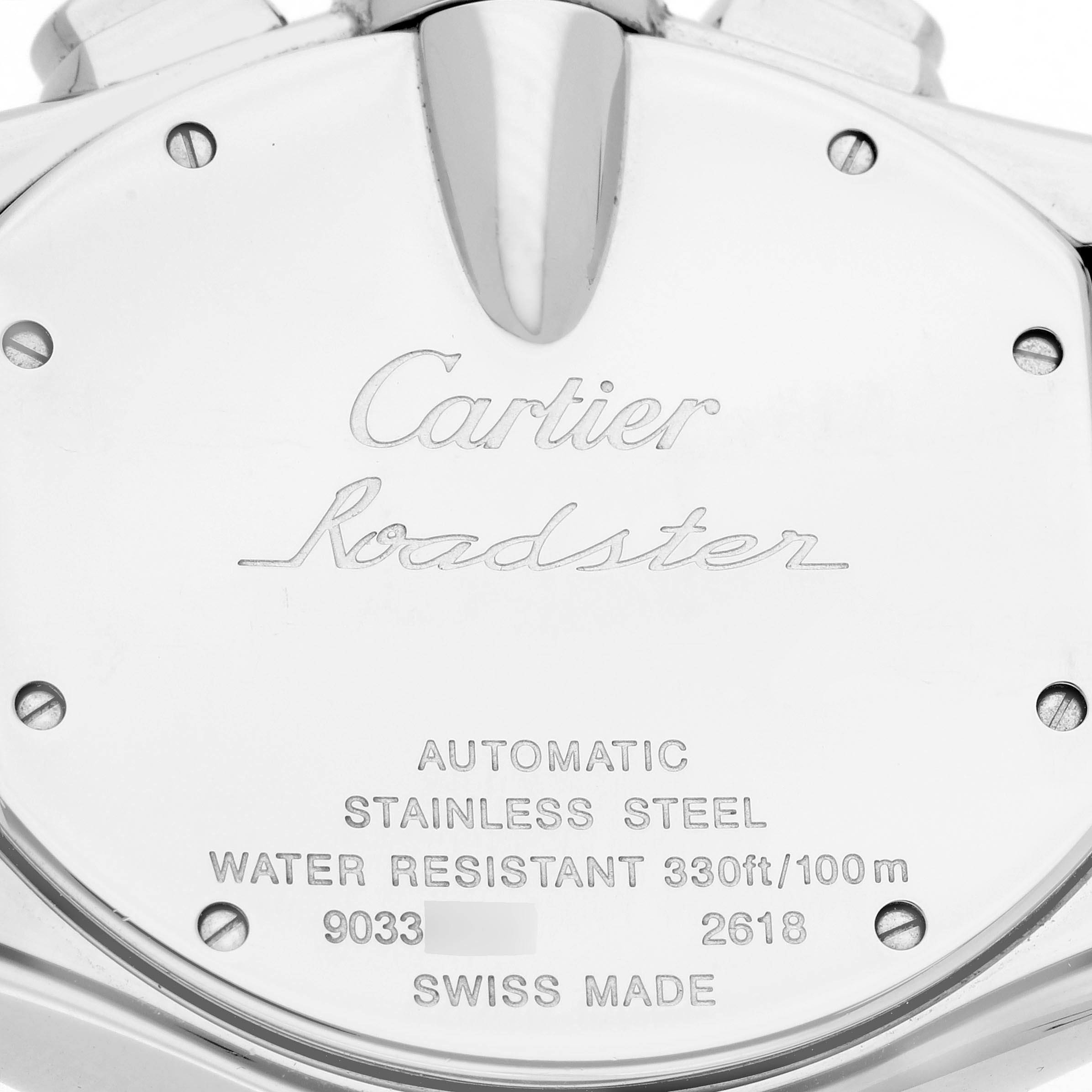 The image shows the back case of the Cartier Roadster W62019X6 Men
s Stainless Steel Silver Dial W62019X6 Men
s Stainless Steel Silver Dial watch, highlighting the brand engraving and specifications.