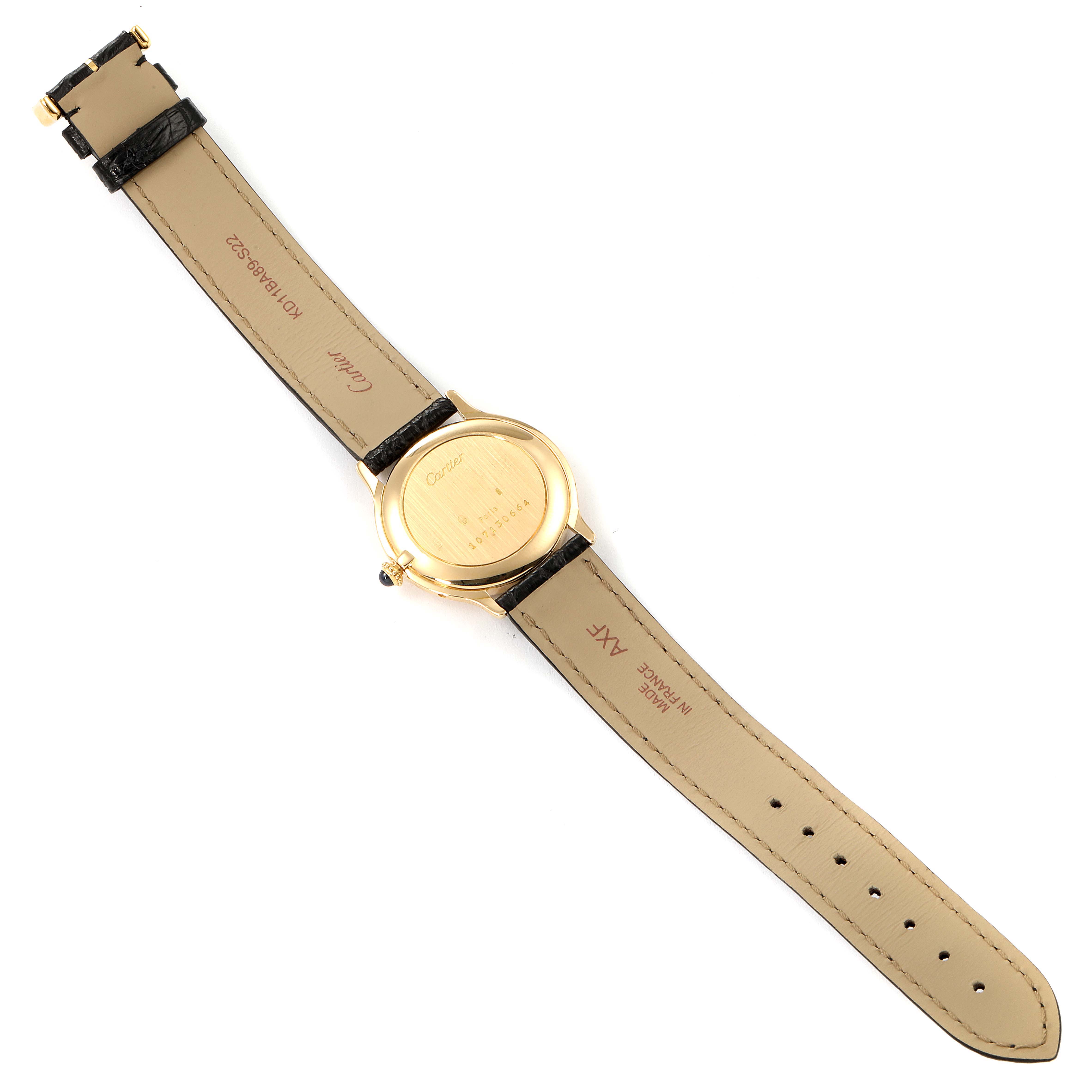 This image shows the back view of a Cartier Ronde  Women's Yellow Gold Silver Dial  Women's Yellow Gold Silver Dial watch, including its leather straps and case back.
