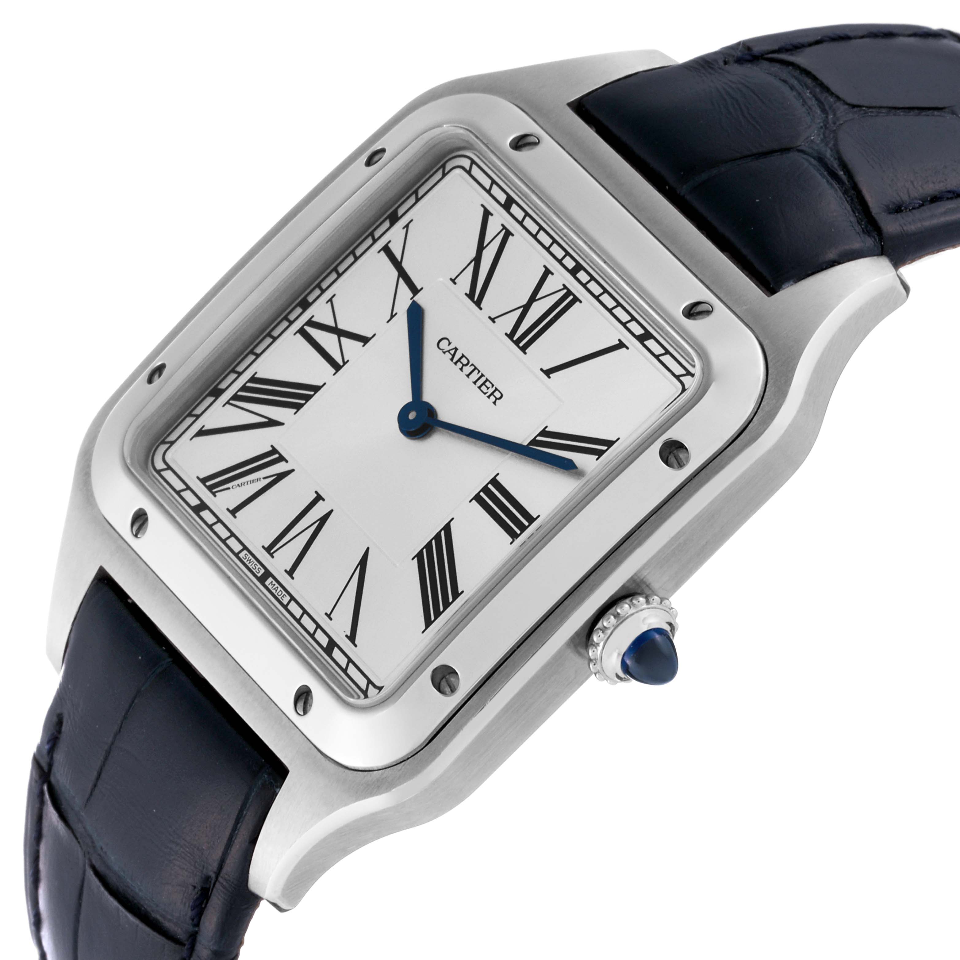 The image shows a Cartier Santos Dumont WSSA0032 Men's Stainless Steel Silver Dial WSSA0032 Men's Stainless Steel Silver Dial watch at an angle highlighting its face, crown, and part of the strap.