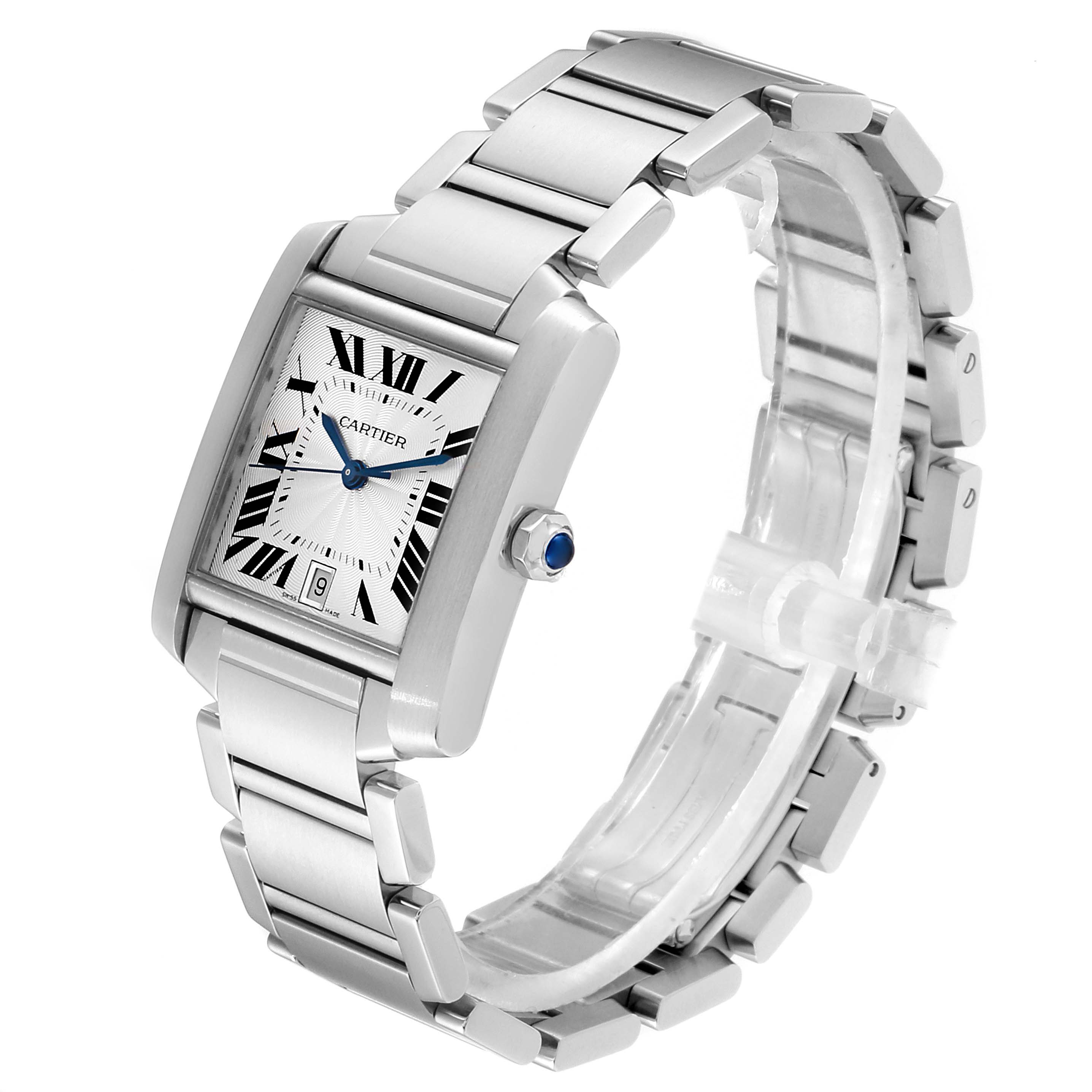 The Tank Française by Cartier is shown at a slight angle, displaying its rectangular face, bracelet, and blue cabochon crown.