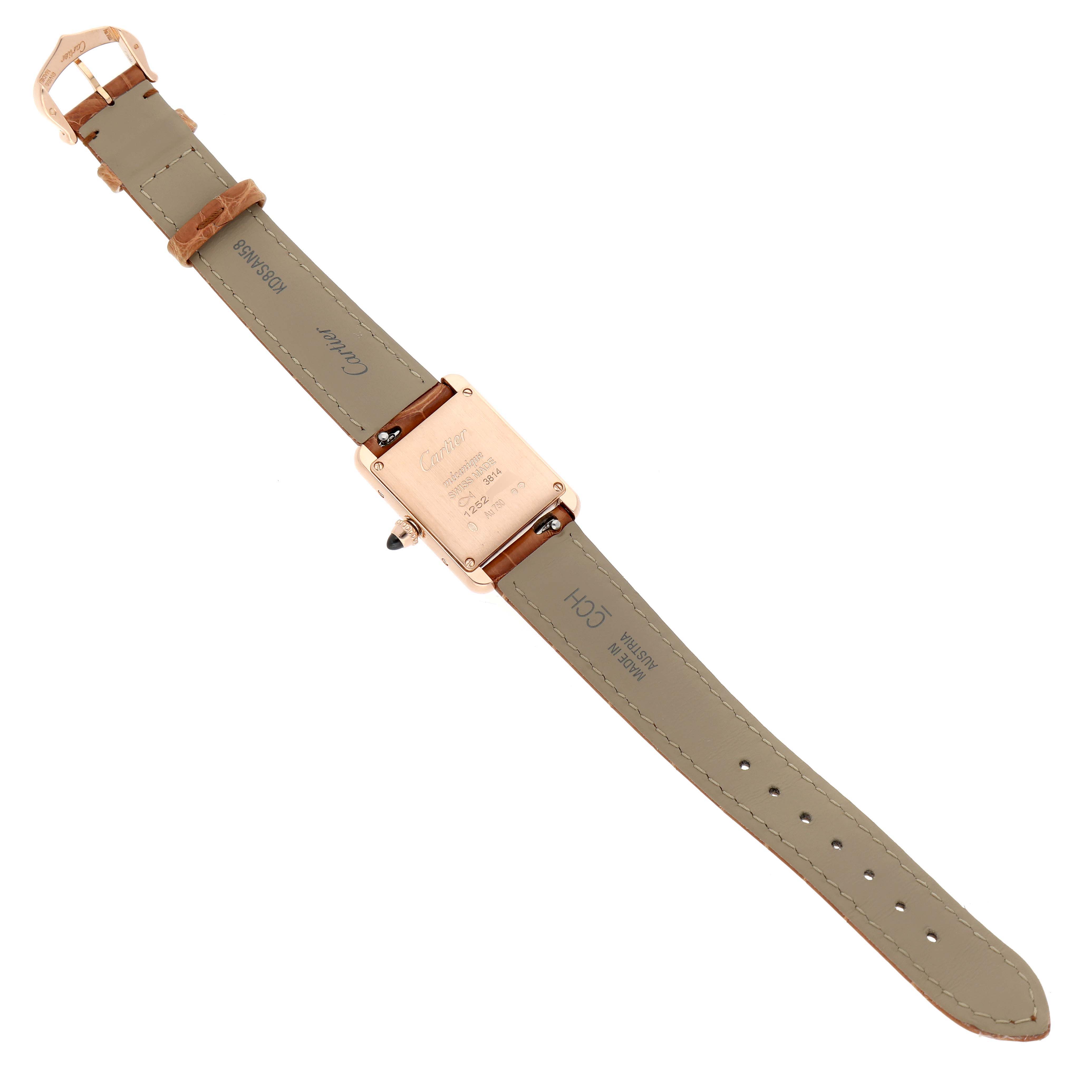 The Cartier Tank Louis WGTA0010 Women's Rose Gold Silver Dial watch is shown from the back, highlighting the case back and leather strap.