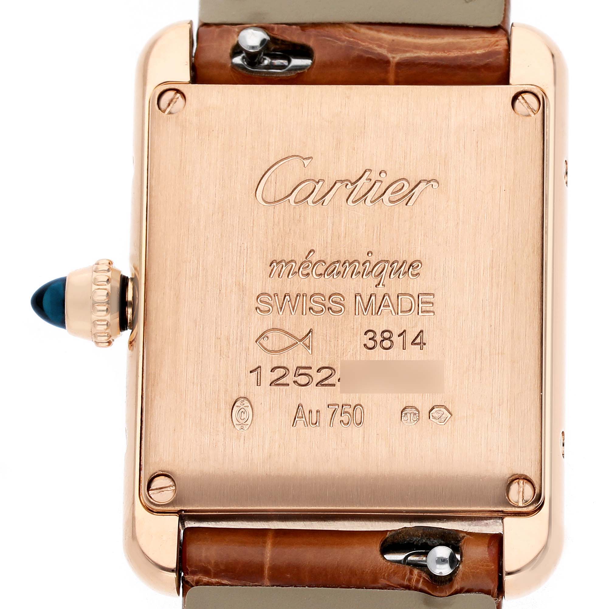 The image shows the back case of the Cartier Tank Louis WGTA0010 Women's Rose Gold Silver Dial watch, featuring engravings and part of the leather strap.