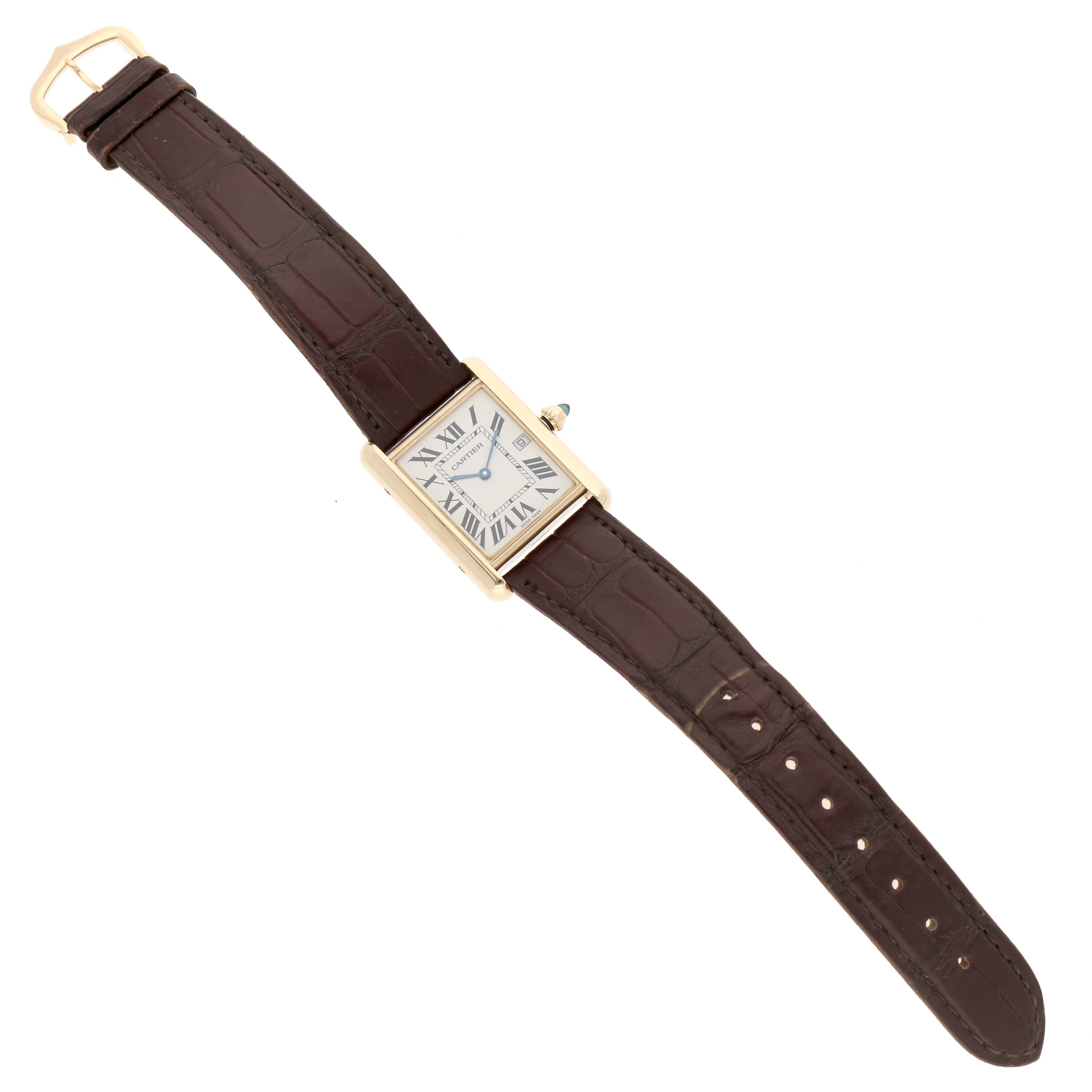 The Cartier Tank Louis W1529756 Men's Yellow Gold Silver Dial watch is shown from a top view, displaying its face, case, and brown leather strap.