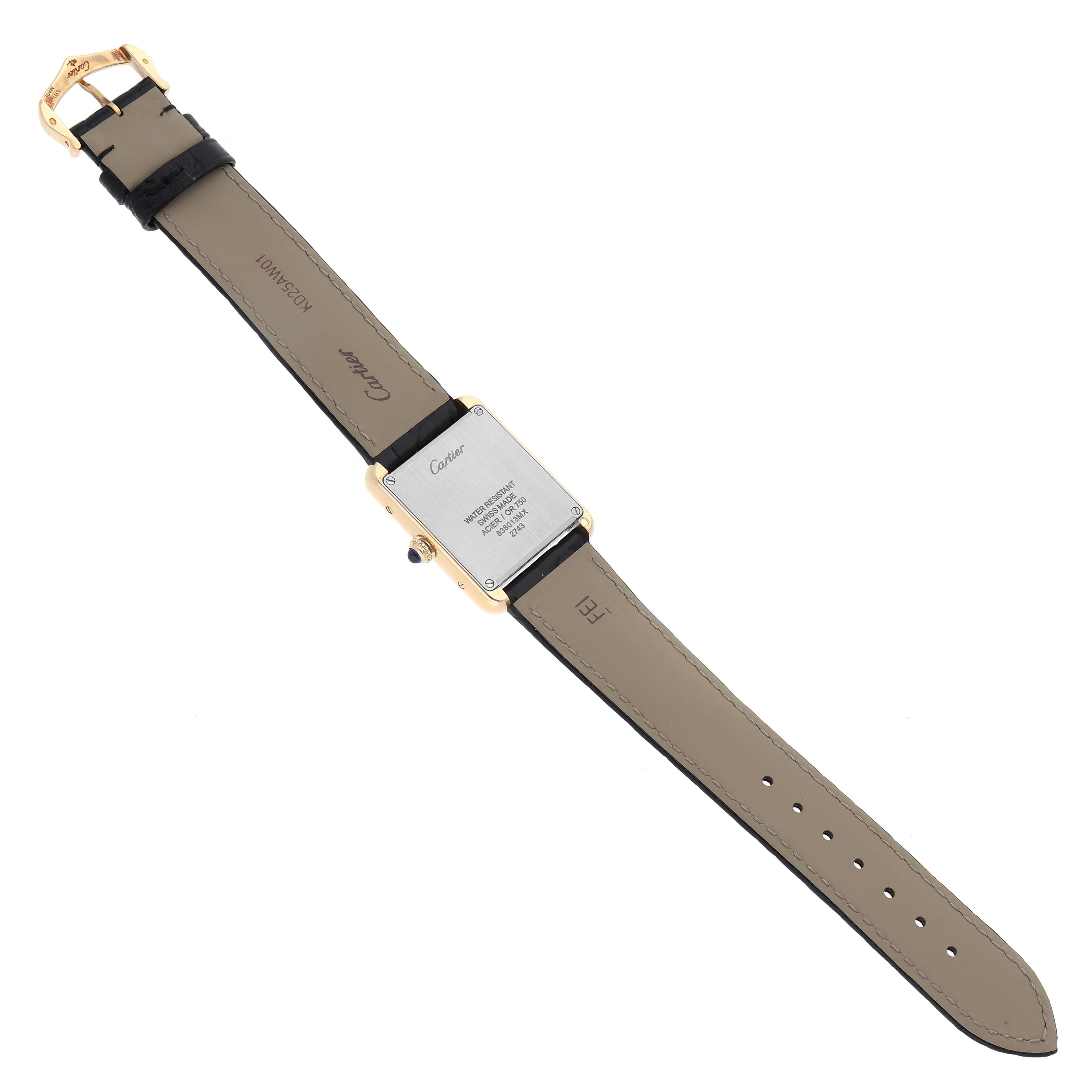 The image shows the back of a Cartier Tank Solo W1018755 Women
s Yellow Gold Silver Dial W1018755 Women
s Yellow Gold Silver Dial watch in a flat, full-length view, highlighting the strap and case back.