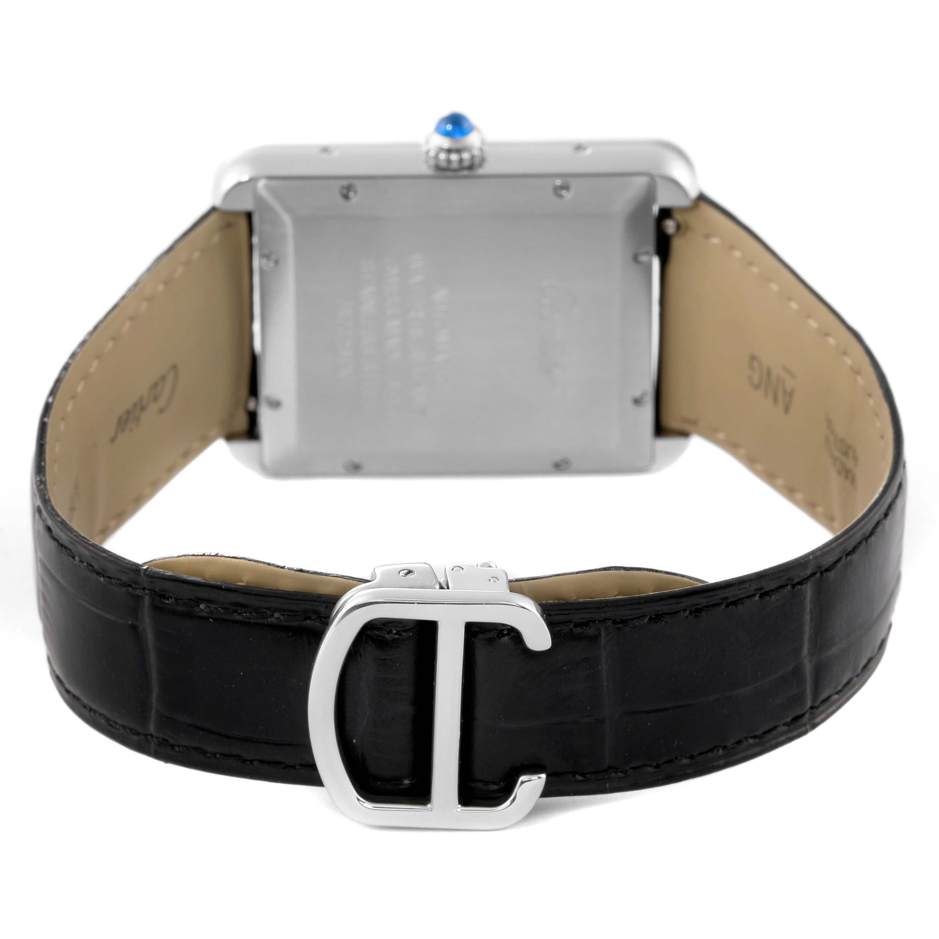 The image shows the rear view of the Cartier Tank Solo W5200027 Men's Stainless Steel Silver Dial W5200027 Men's Stainless Steel Silver Dial watch, focusing on its metal case, crown, and black leather strap with a clasp.