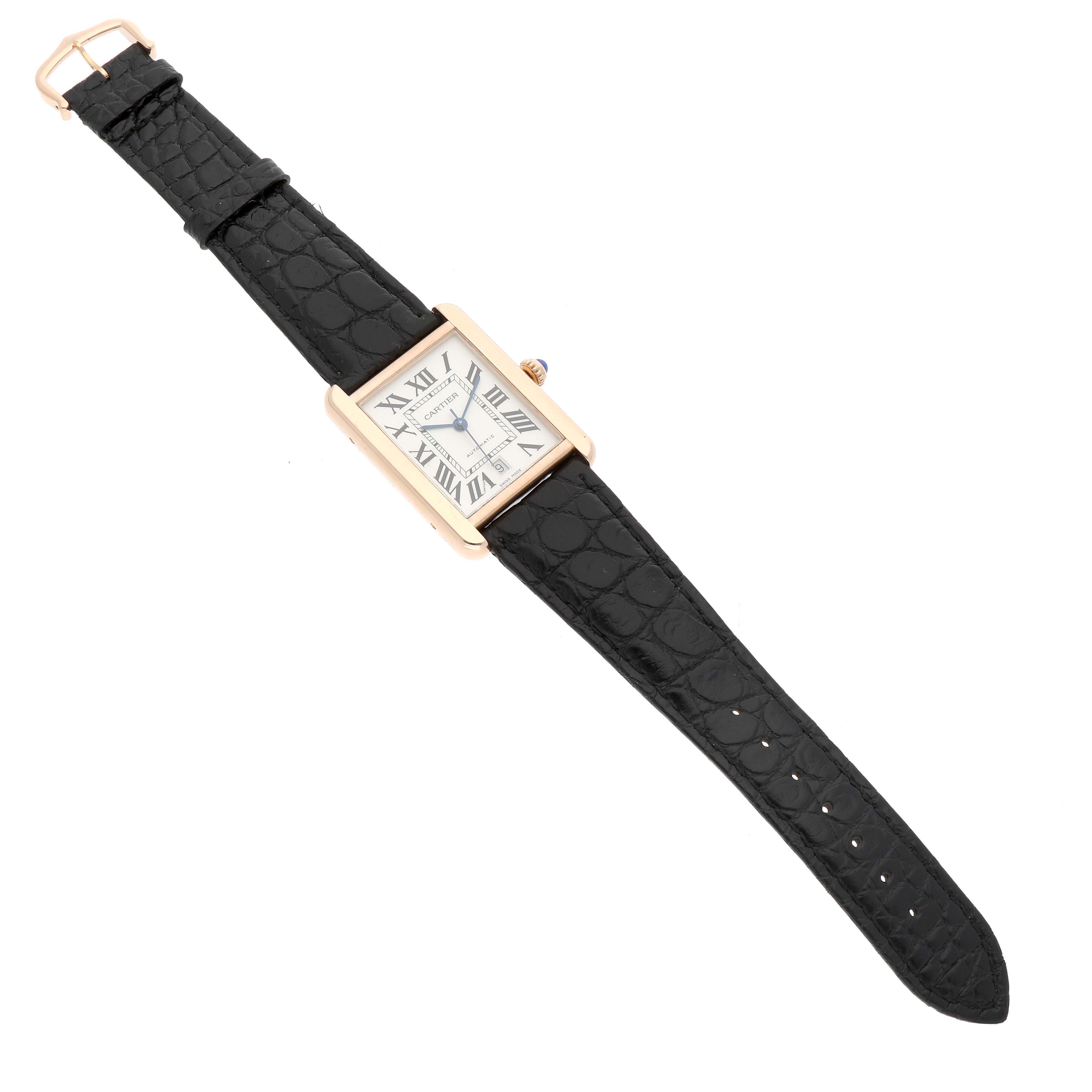 The Cartier Tank Solo W5200026 Men's Rose Gold Silver Dial watch is shown from an overhead angle, displaying its rectangular face, Roman numerals, and black leather strap.
