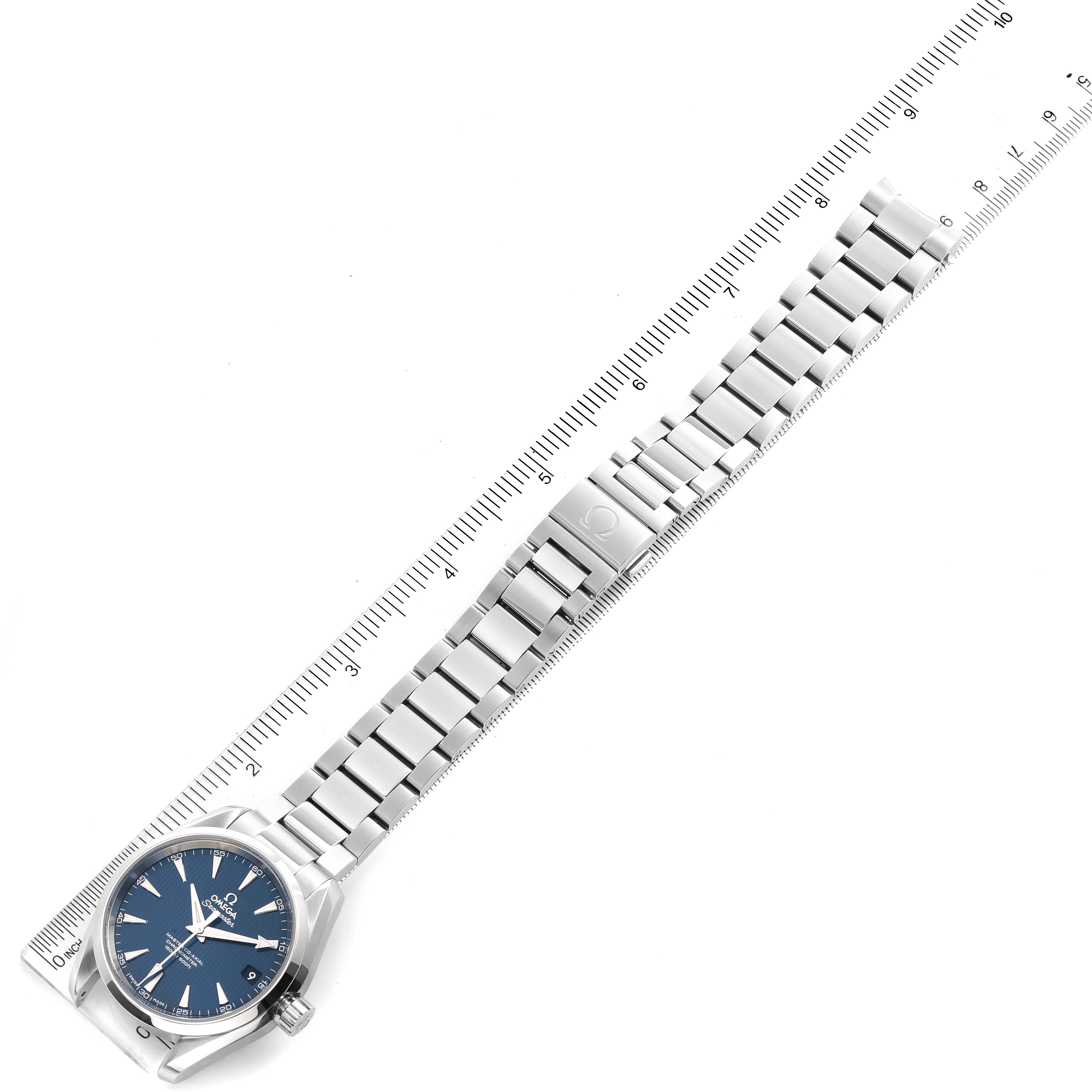The Omega Aqua Terra 231.10.39.21.03.002 Men
s Stainless Steel Blue Dial 231.10.39.21.03.002 Men
s Stainless Steel Blue Dial watch is shown from a top view, displaying the face, bezel, crown, and full metal bracelet measured against a ruler.