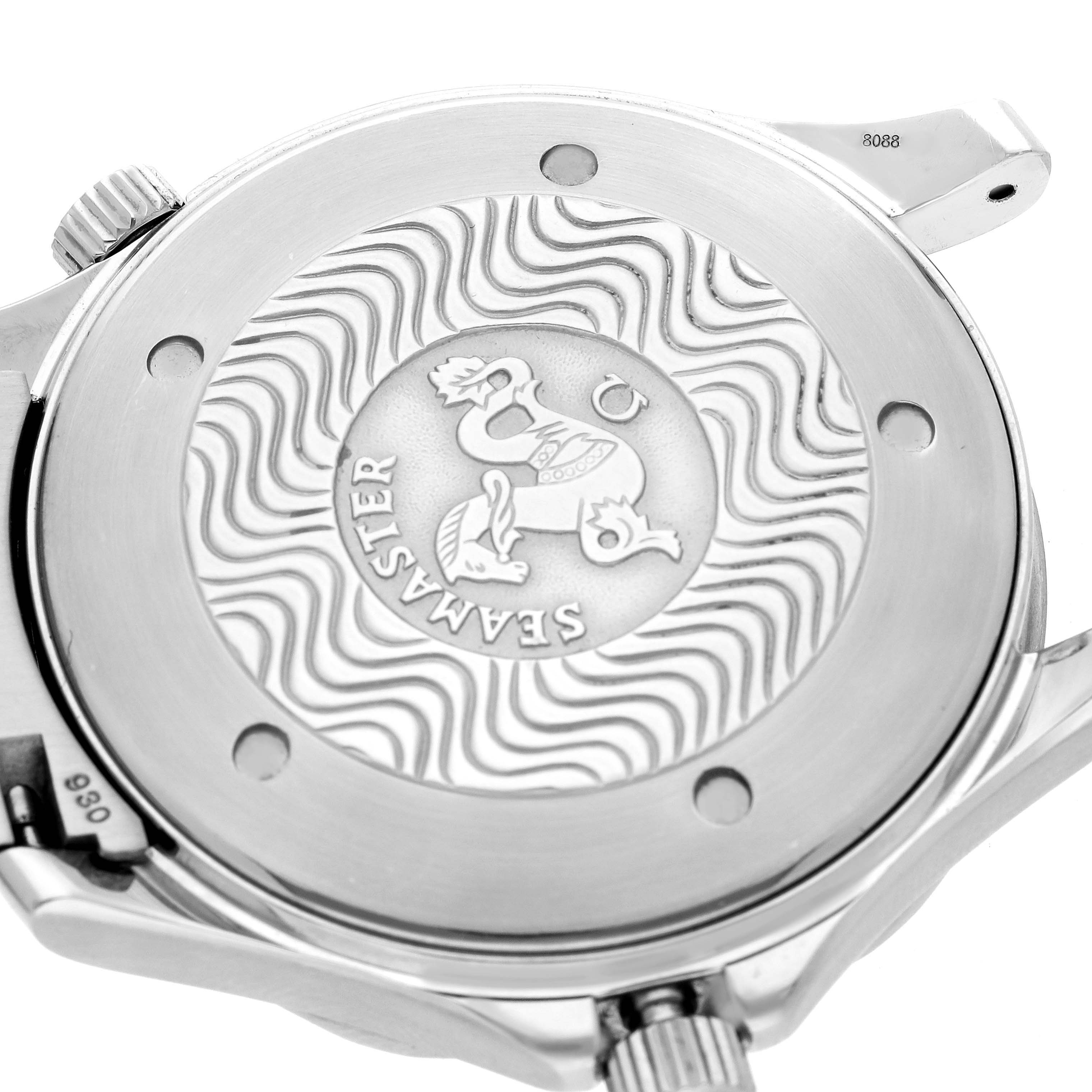 The image shows the back of an Omega Seamaster 2254.50.00 Men
s Stainless Steel Black Dial 2254.50.00 Men
s Stainless Steel Black Dial watch, highlighting the engraved logo and wave pattern.