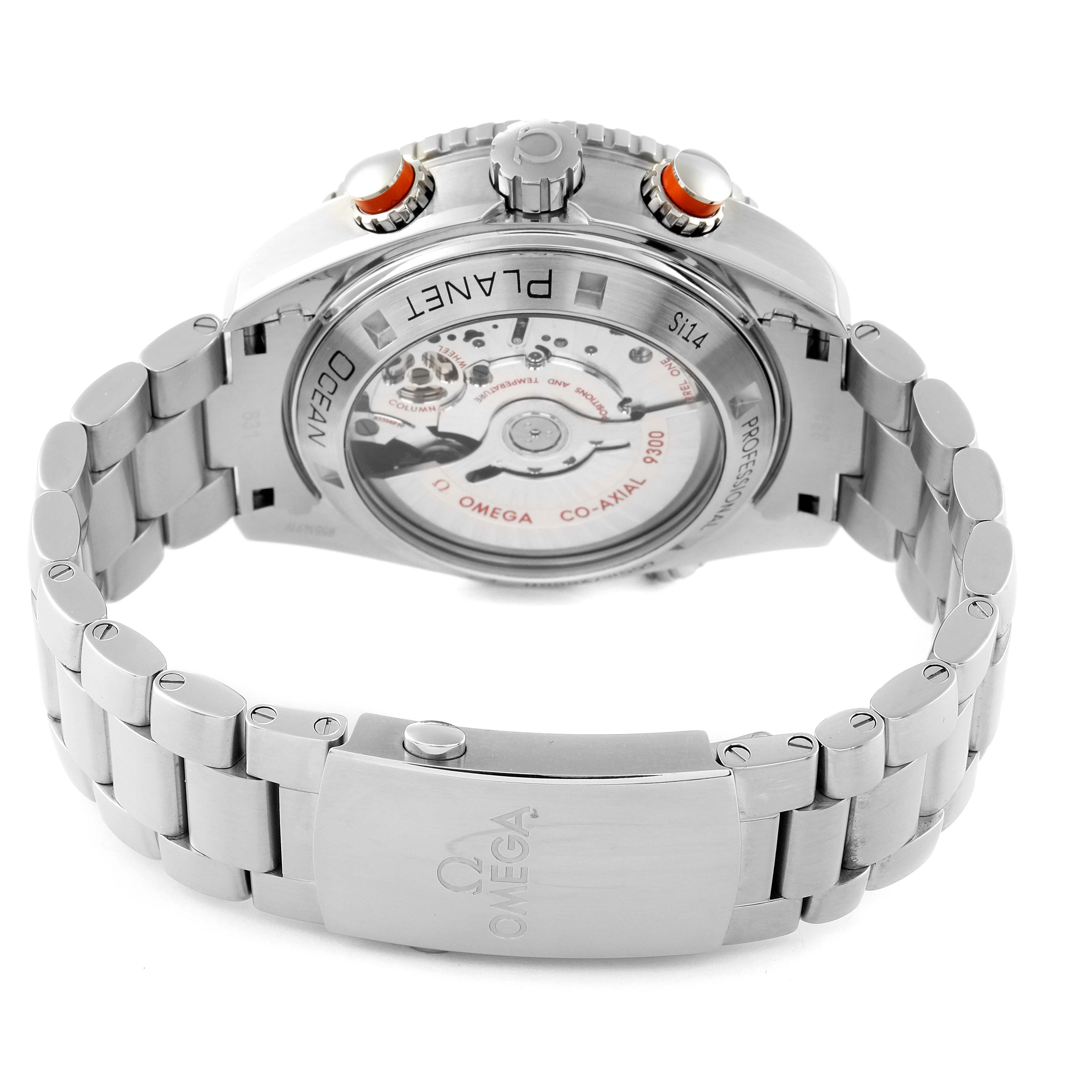 The image shows the back of an Omega Planet Ocean 232.30.46.51.01.002 Men's Stainless Steel Black Dial 232.30.46.51.01.002 Men's Stainless Steel Black Dial watch, highlighting the case back, movement, and part of the steel bracelet.