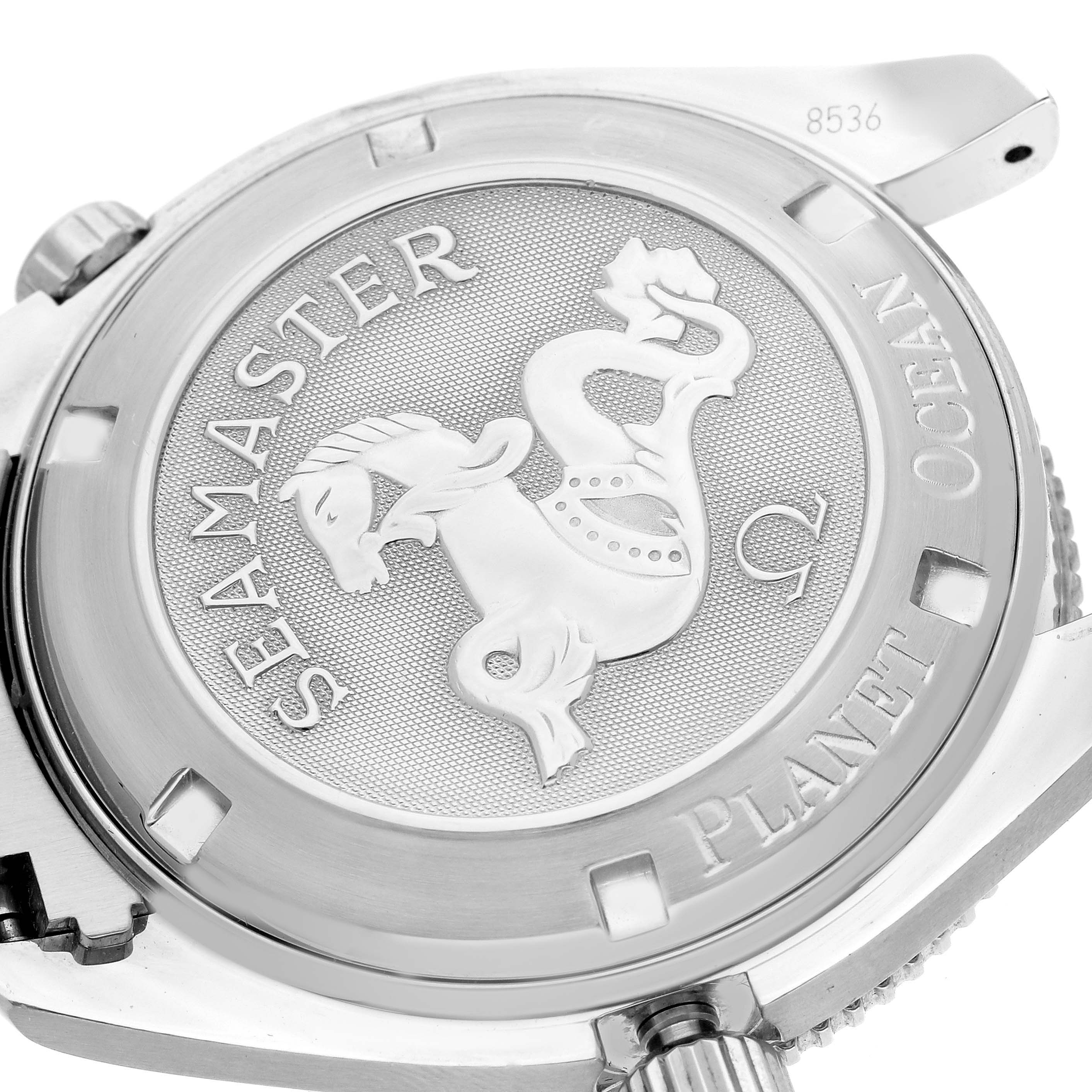 The image shows the case back of the Omega Planet Ocean 2201.51.00 Men
s Stainless Steel Black Dial 2201.51.00 Men
s Stainless Steel Black Dial, highlighting the engraved "Seamaster" logo and branding details.