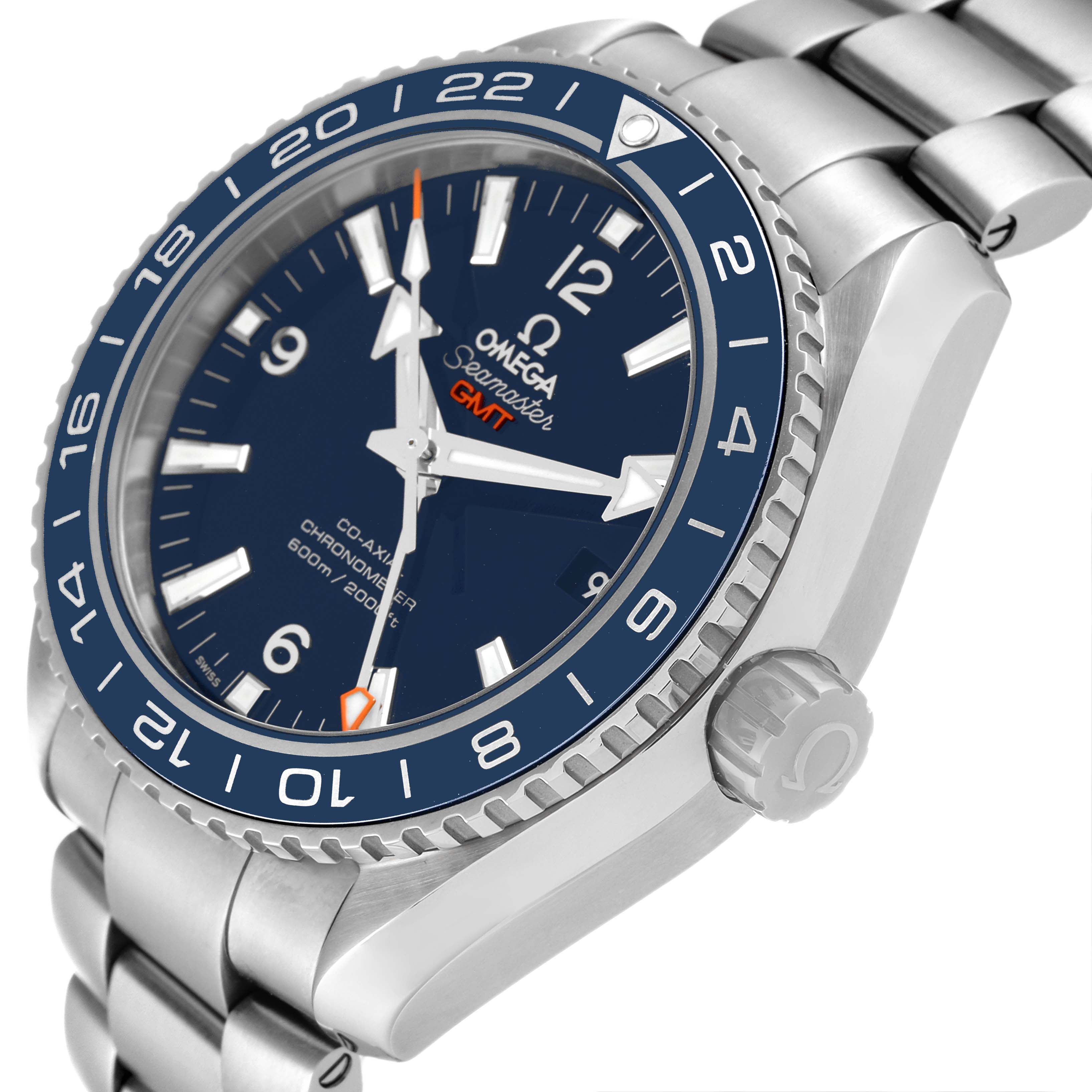 The image shows an angled view of the Omega Seamaster Planet Ocean watch highlighting the face, bezel, crown, and part of the bracelet.