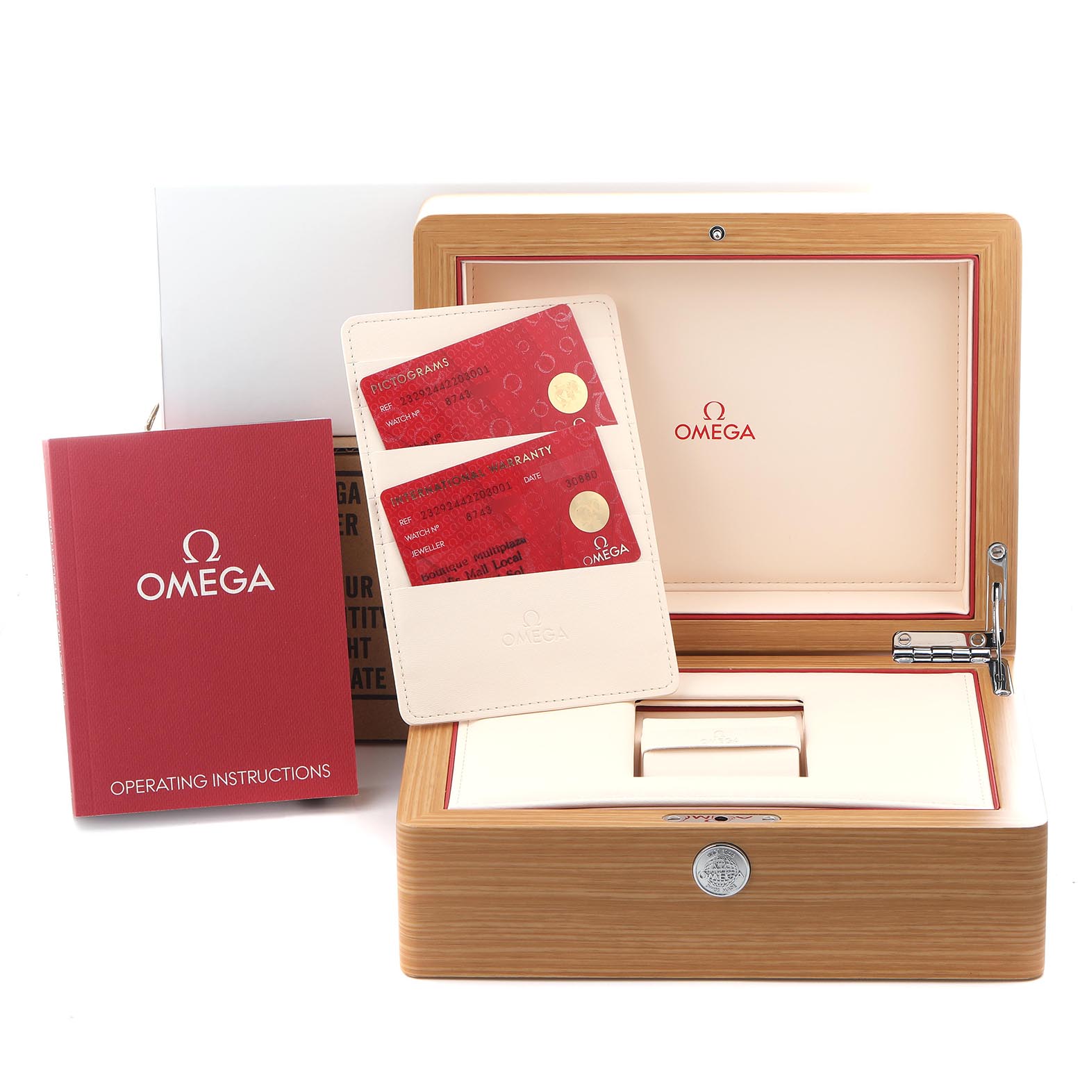 The image shows the Omega Planet Ocean 232.92.44.22.03.001 Men
s Stainless Steel Blue Dial 232.92.44.22.03.001 Men
s Stainless Steel Blue Dial box, warranty cards, and operating instructions.