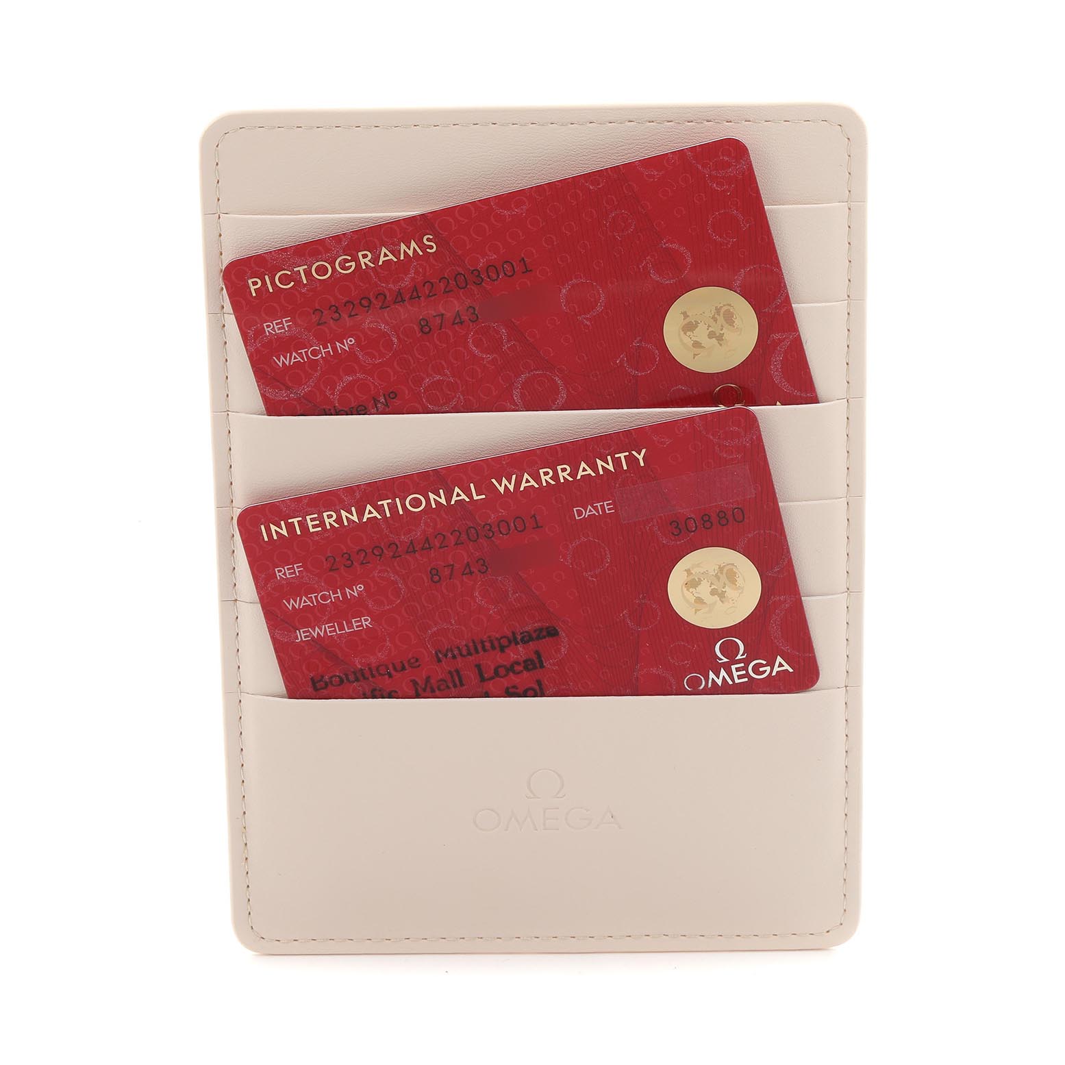 The image shows two red cards, Pictograms and International Warranty, for an Omega Planet Ocean 232.92.44.22.03.001 Men
s Stainless Steel Blue Dial 232.92.44.22.03.001 Men
s Stainless Steel Blue Dial model, in a beige cardholder.