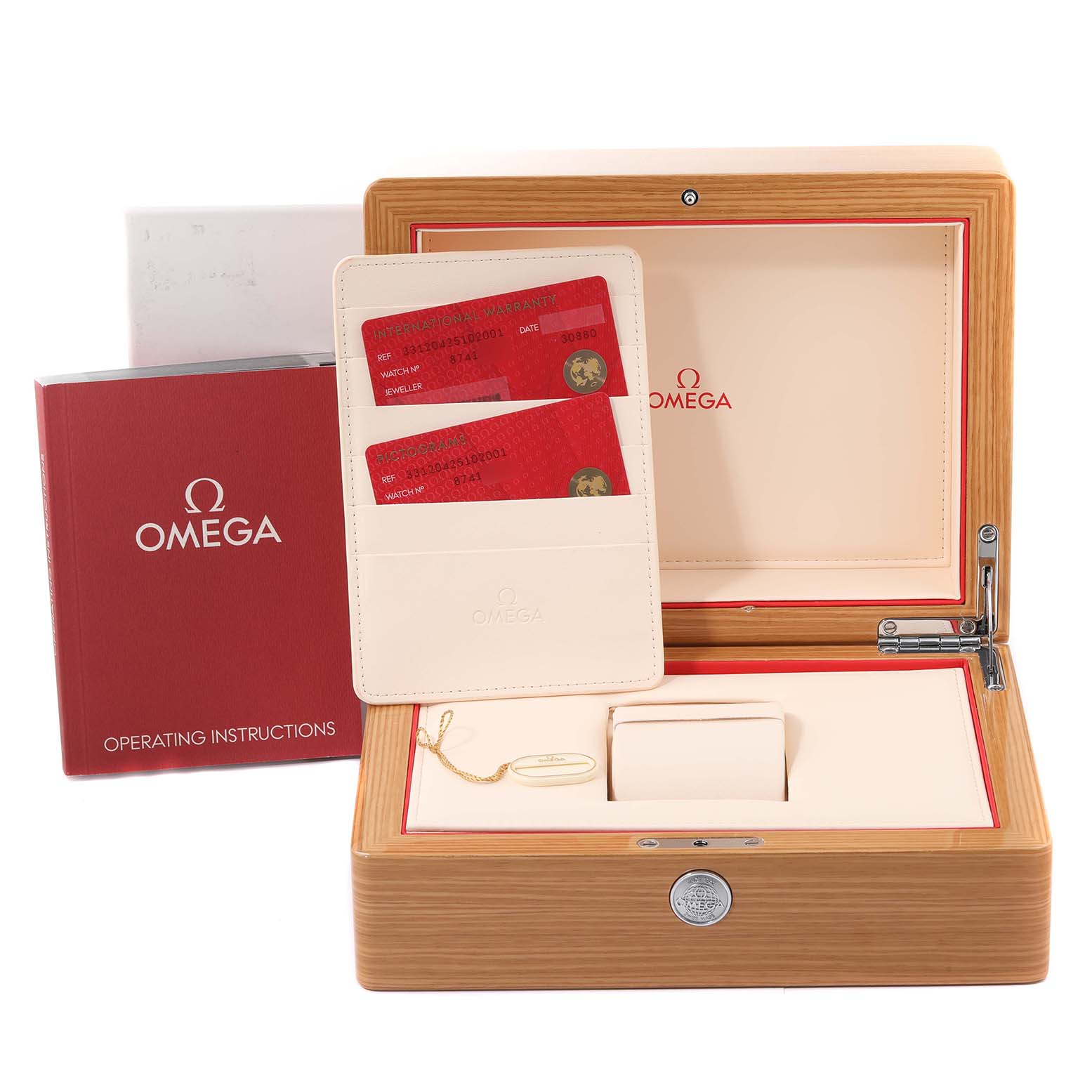 The image shows a wooden box for an Omega Speedmaster 331.20.42.51.02.001 Men's Steel and Gold (two tone) Silver Dial 331.20.42.51.02.001 Men's Steel and Gold (two tone) Silver Dial containing warranty cards, operating instructions, and a watch holder.