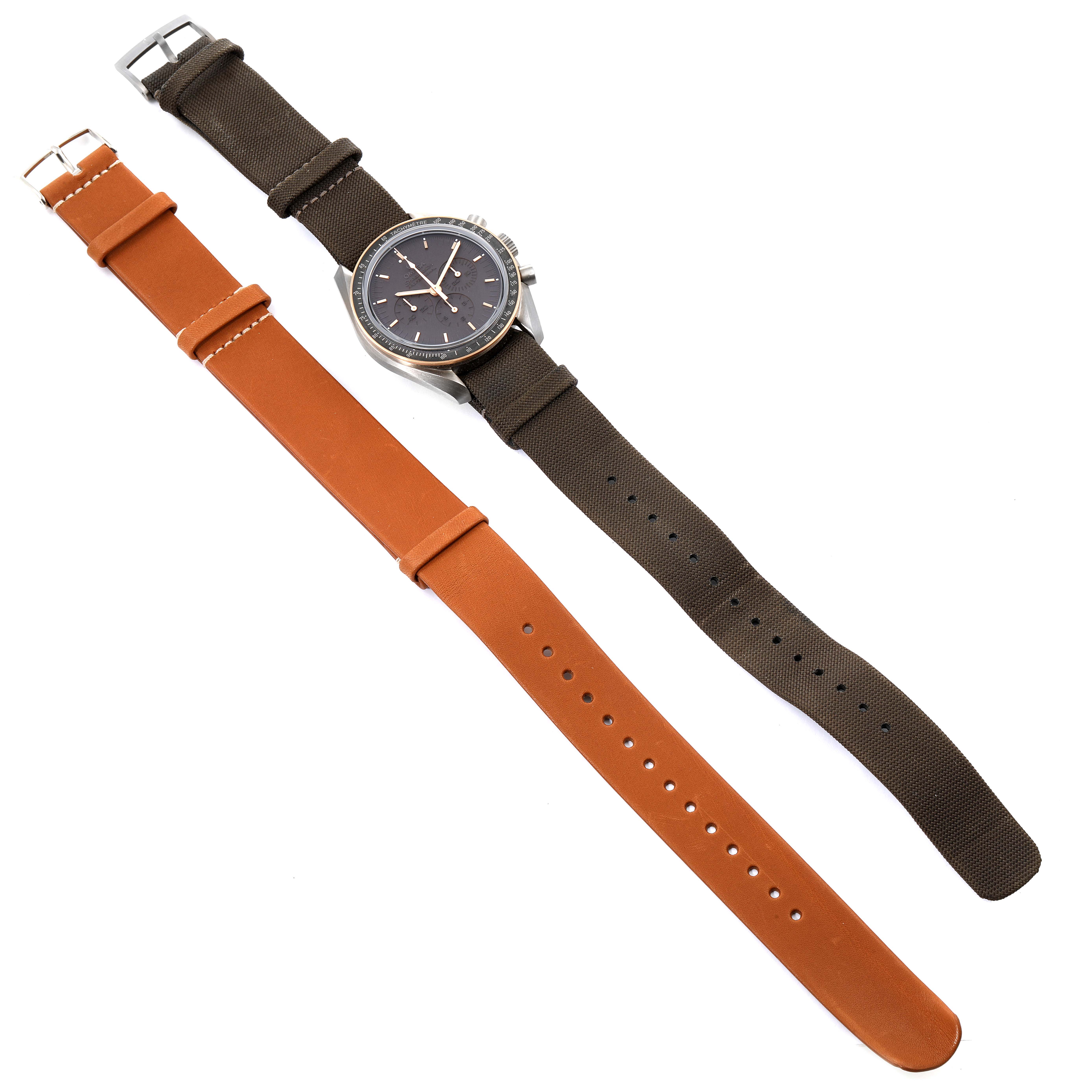 The image shows an Omega Speedmaster 311.62.42.30.06.001 Men's Titanium Grey Dial 311.62.42.30.06.001 Men's Titanium Grey Dial watch with a brown strap and an additional orange strap, both viewed from above.
