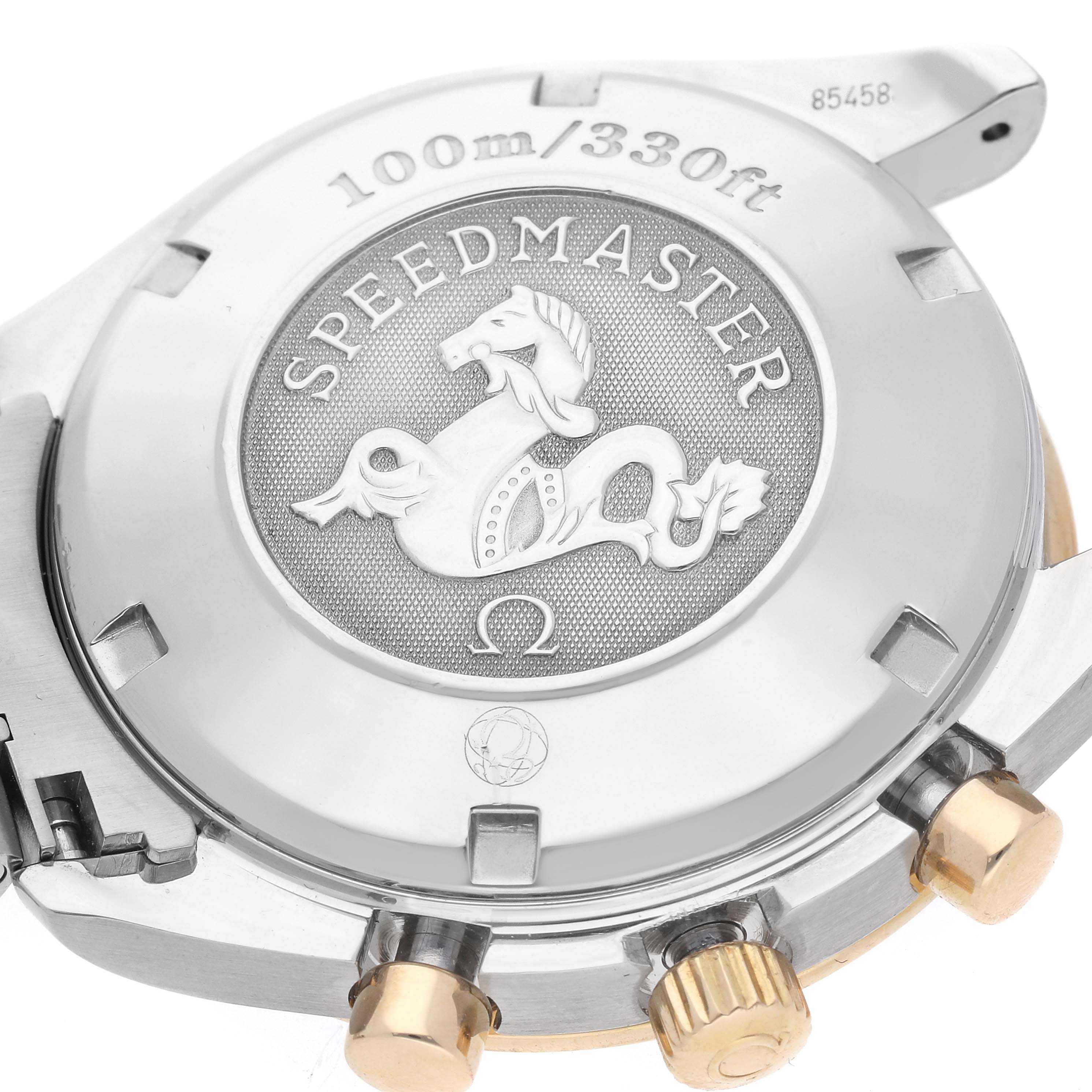 The image shows the back of an Omega Speedmaster 323.21.40.40.02.001 Men
s Steel and Gold (two tone) Silver Dial 323.21.40.40.02.001 Men
s Steel and Gold (two tone) Silver Dial watch, highlighting the case back design and crown.