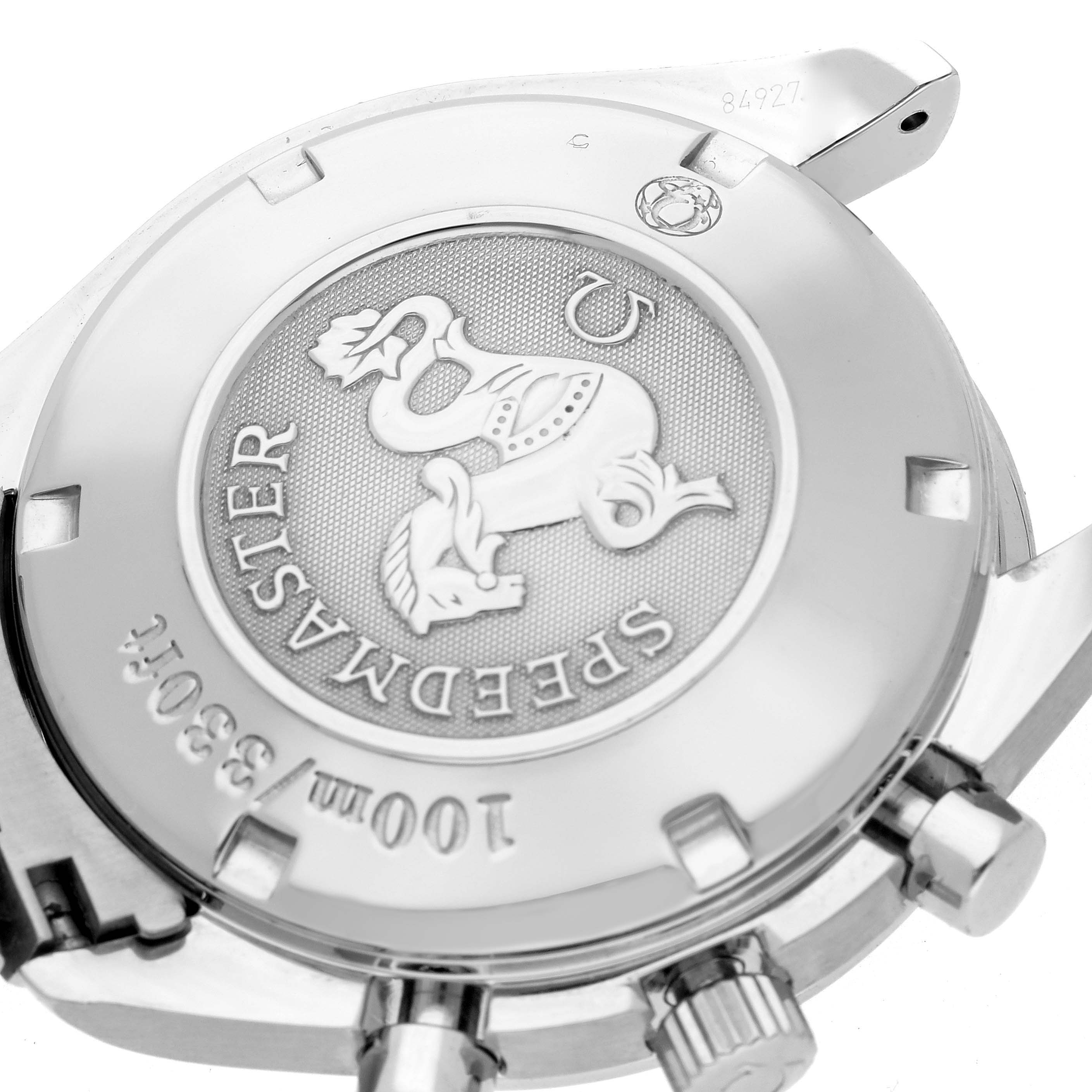 The image shows the back case of an Omega Speedmaster 323.10.40.40.02.001 Men
s Stainless Steel Silver Dial 323.10.40.40.02.001 Men
s Stainless Steel Silver Dial, highlighting the brand engraving and button details.