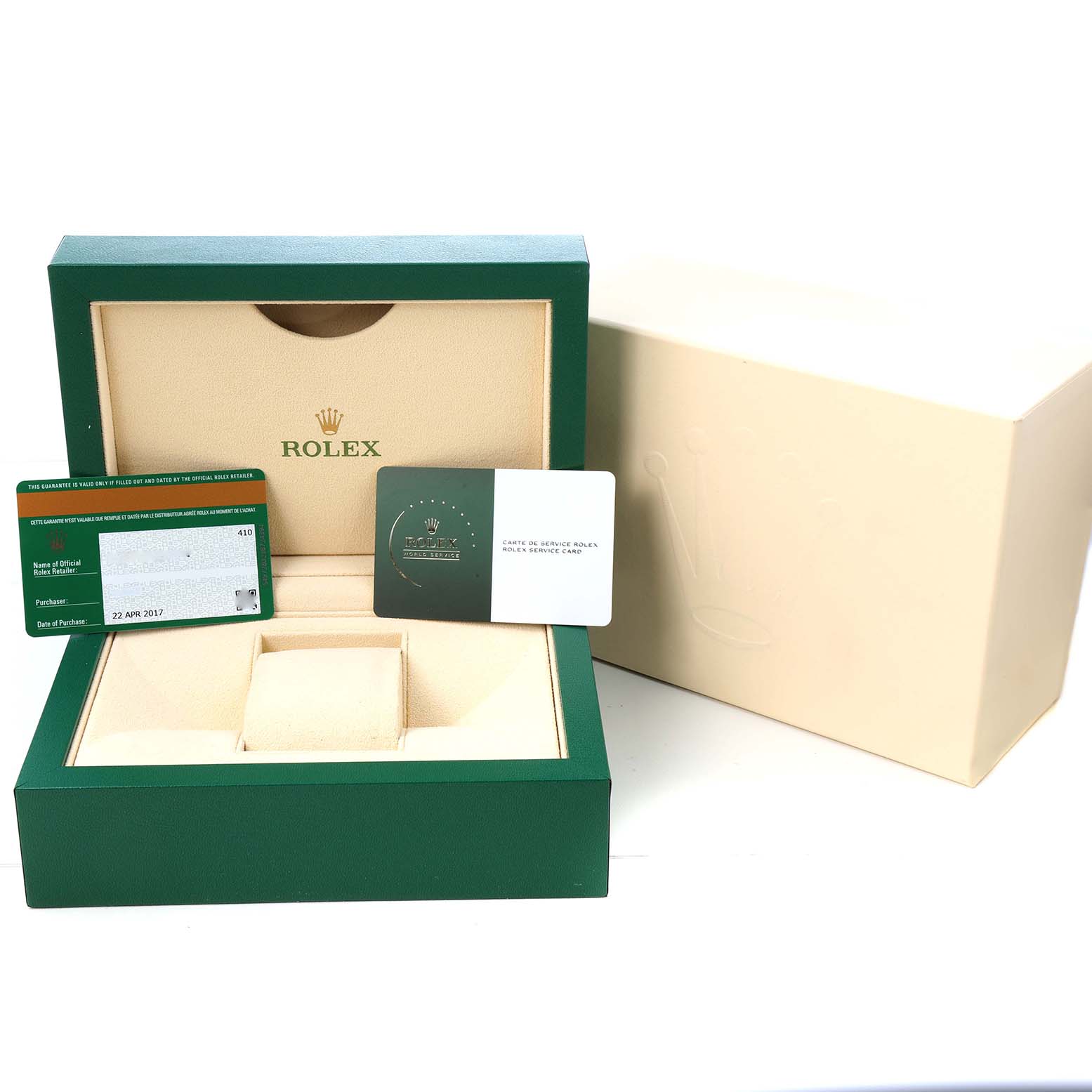 This image shows a Rolex Air-King 116900 Men's Stainless Steel Black Dial watch box with certification cards, angled to display the interior and accompanying accessories.
