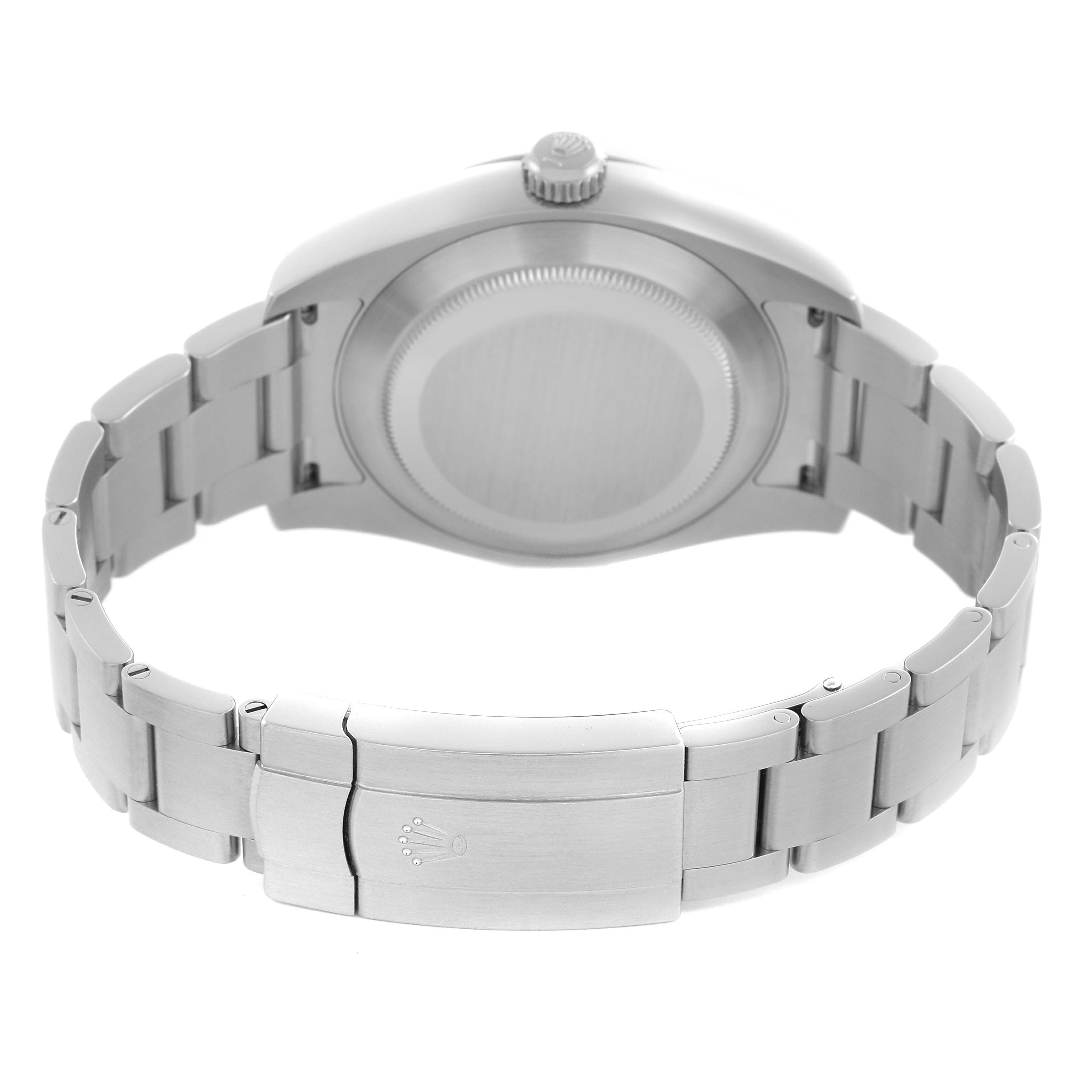 The Rolex Air-King 116900 Men's Stainless Steel Black Dial 116900 Men's Stainless Steel Black Dial watch is shown from the back, displaying its case back, bracelet, and crown.