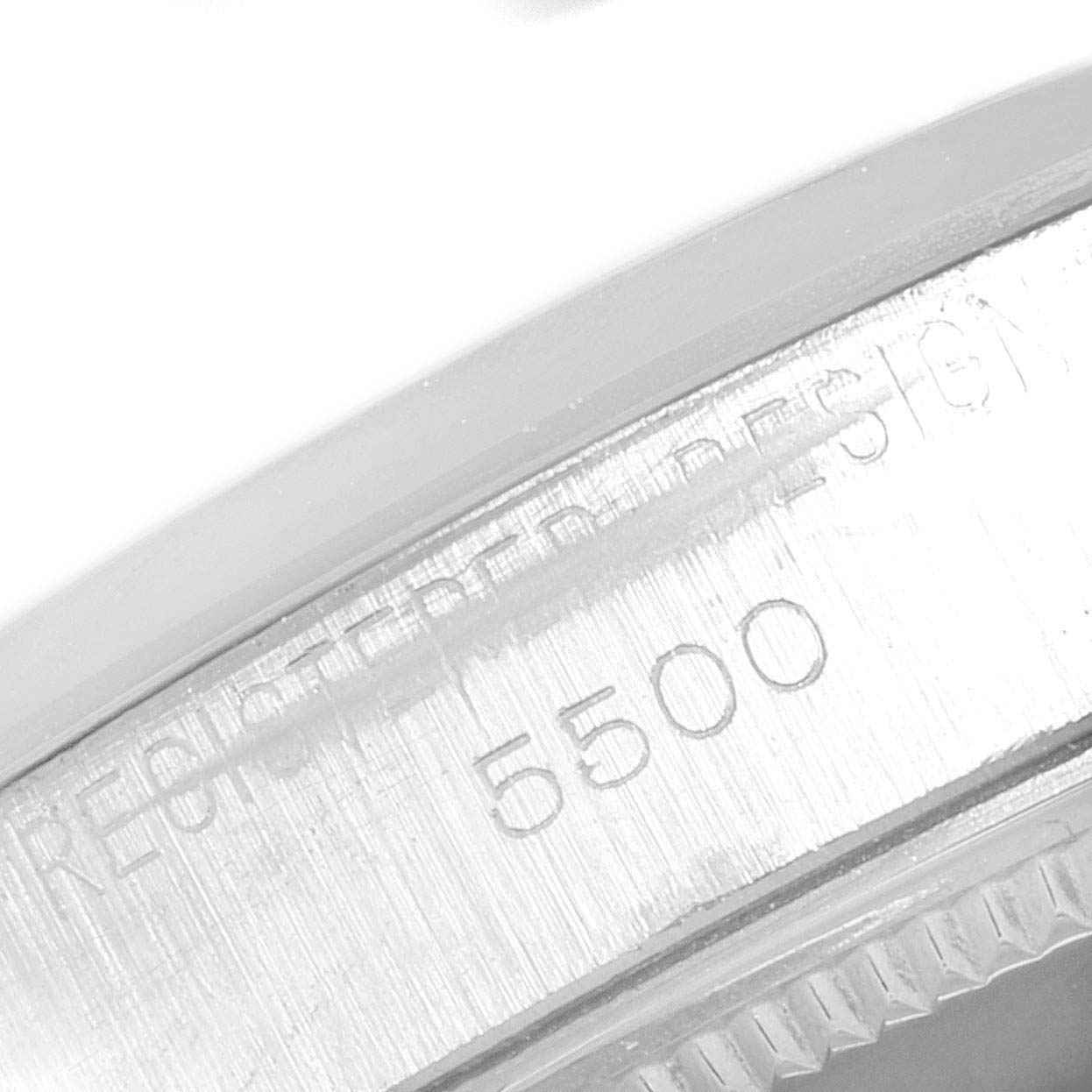 The image shows a close-up view of the engraved bezel, featuring model number 5500, of a Rolex Vintage Collection 5500 Men
s Stainless Steel Silver Dial 5500 Men
s Stainless Steel Silver Dial watch.