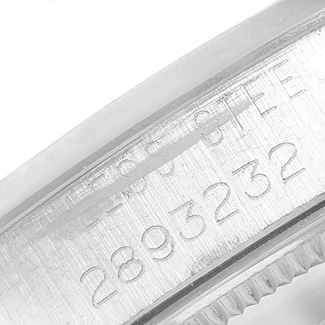 This image shows a close-up of the engraved serial number on a Rolex Vintage Collection 5500 Men
s Stainless Steel Silver Dial 5500 Men
s Stainless Steel Silver Dial watch.