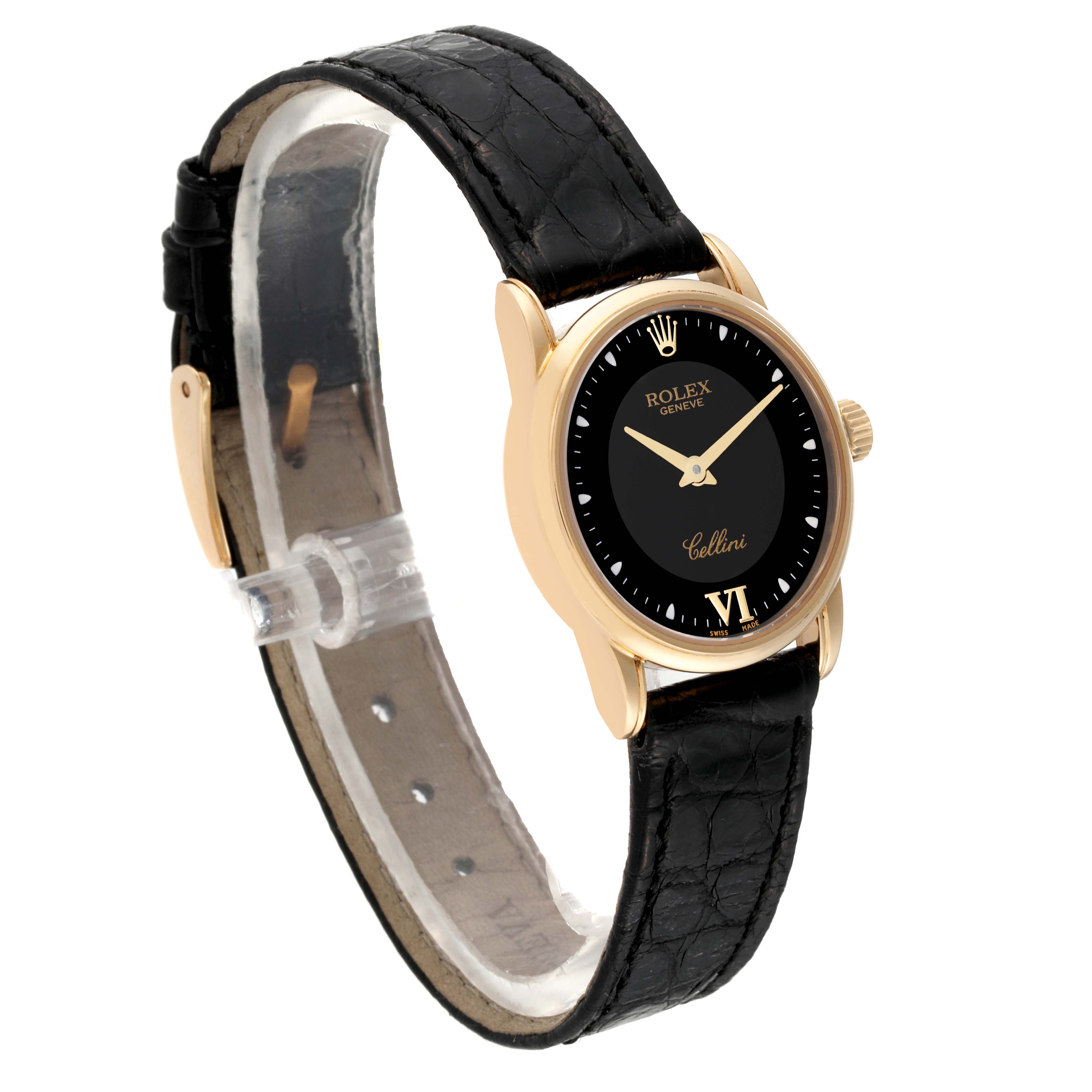 The image shows a Rolex Cellini 6111/8 Women
s Yellow Gold Black Dial 6111/8 Women
s Yellow Gold Black Dial watch at a three-quarter angle, highlighting its black dial, gold case, and black leather strap.