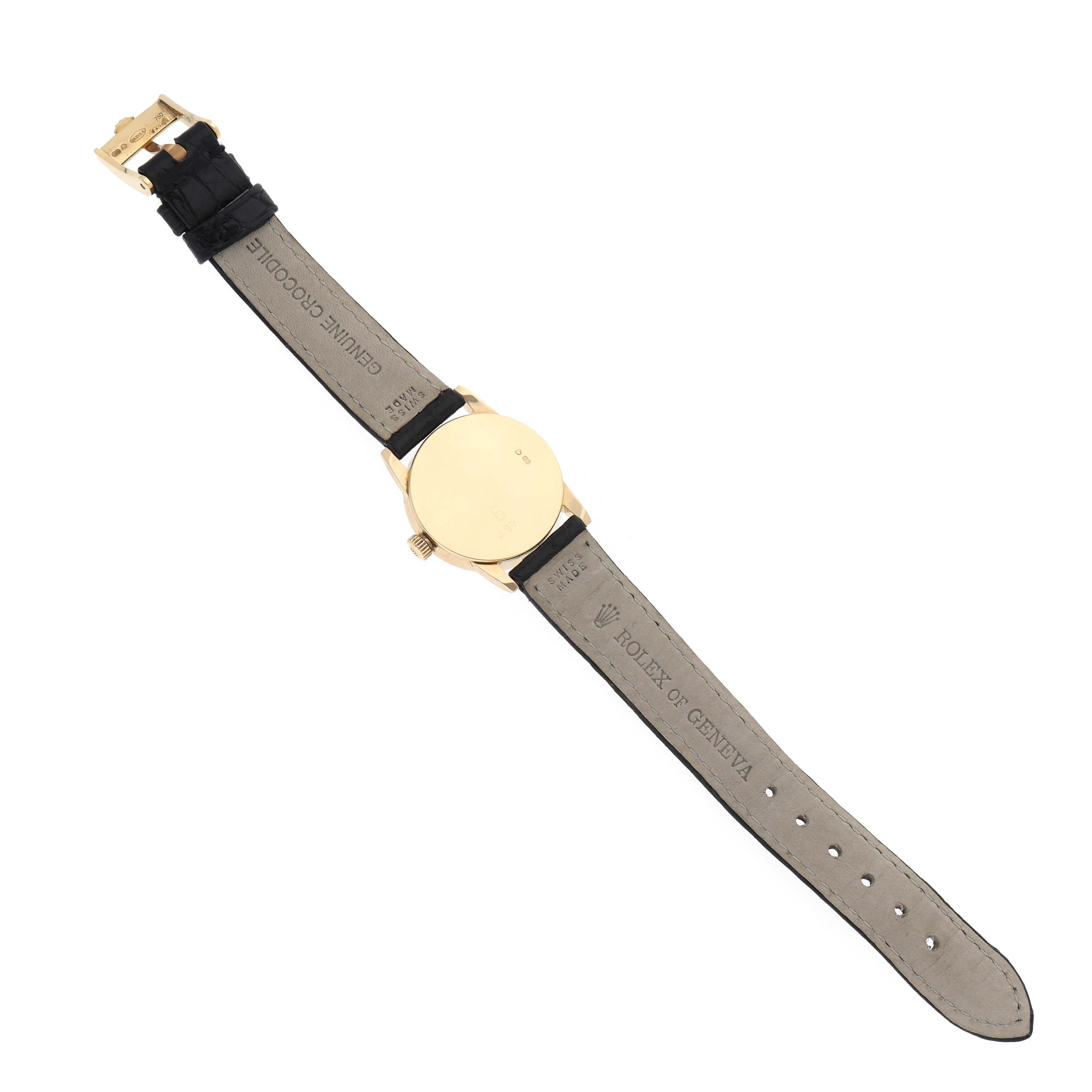 The image shows the back of the Rolex Cellini 6111/8 Women
s Yellow Gold Black Dial 6111/8 Women
s Yellow Gold Black Dial watch laid flat, revealing the leather strap and case back.