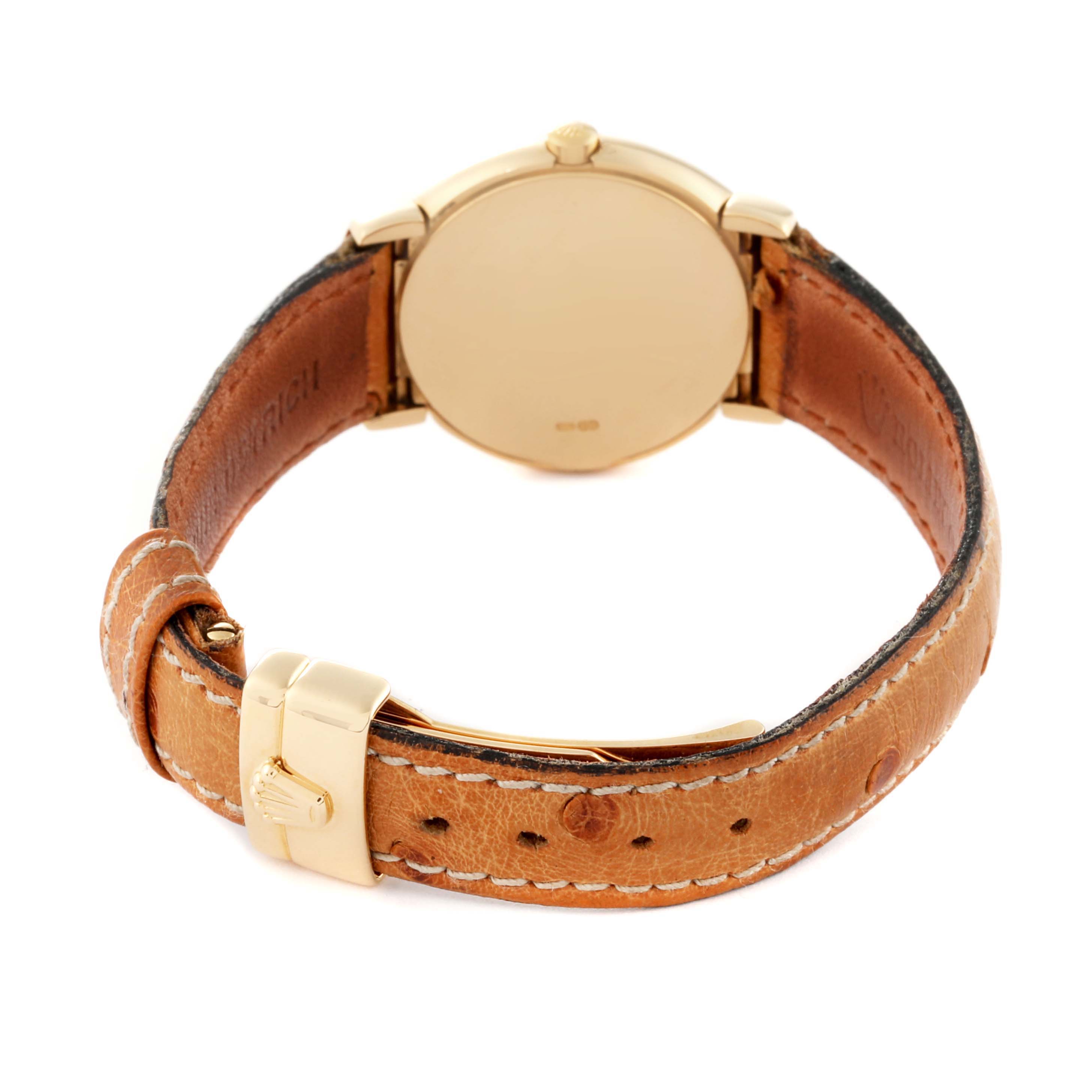 This image shows the back view of the Rolex Cellini 6621/8 Women's Yellow Gold Champagne Dial 6621/8 Women's Yellow Gold Champagne Dial watch, highlighting the gold case and brown leather strap with a gold buckle.