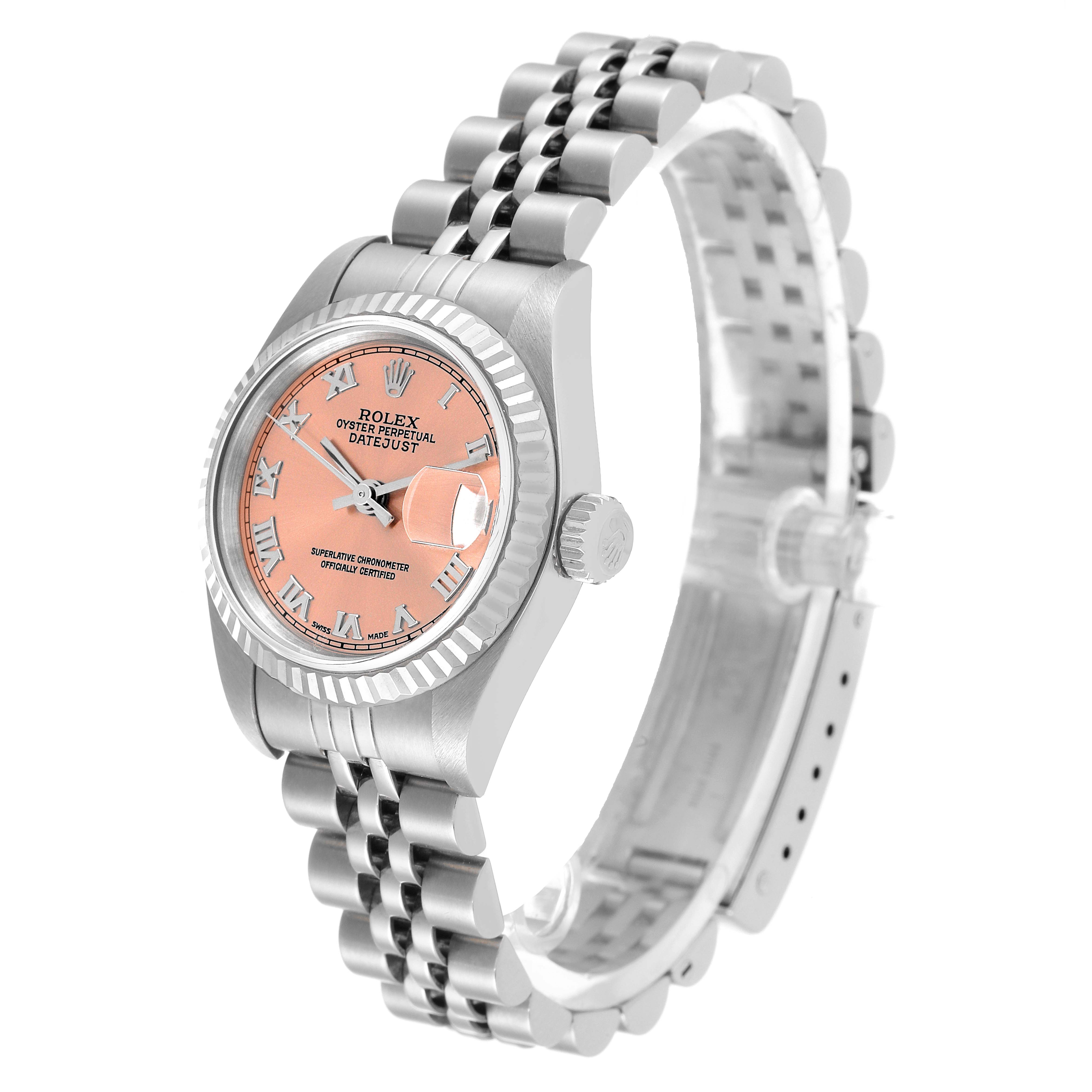 The Rolex Datejust 79174 Women
s Stainless Steel Pink Dial 79174 Women
s Stainless Steel Pink Dial watch is shown at a three-quarter angle, highlighting the dial, bezel, crown, and part of the bracelet.