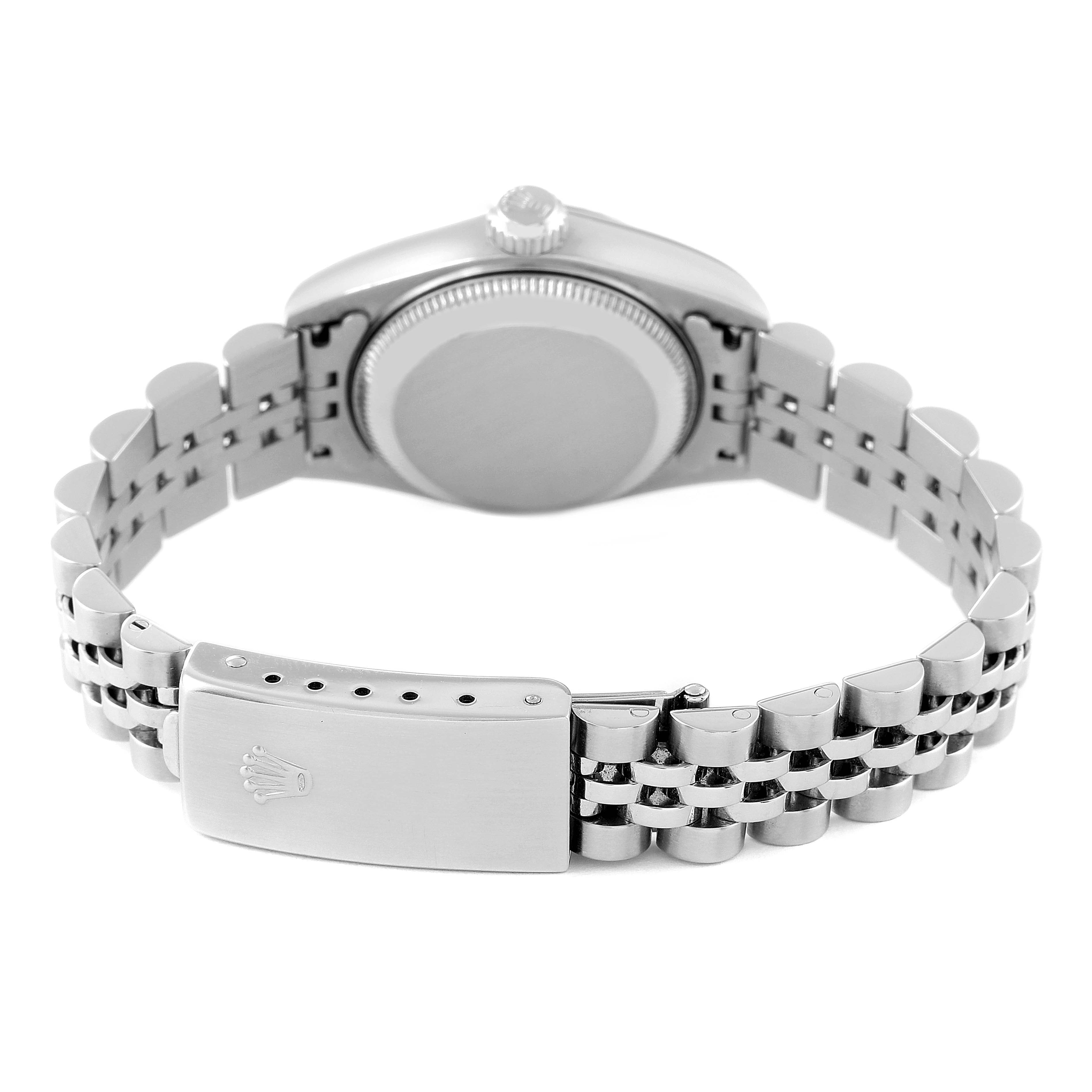 The image shows the back and clasp of a Rolex Datejust 79174 Women
s Stainless Steel Pink Dial 79174 Women
s Stainless Steel Pink Dial, highlighting the bracelet and caseback from a low angle.