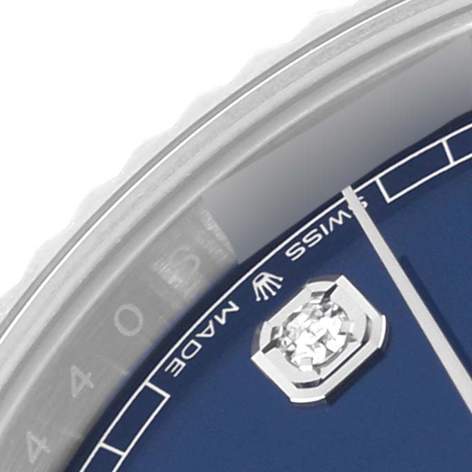 This close-up image shows the dial of a Rolex Datejust 41 126334 Men
s Stainless Steel Blue Dial 126334 Men
s Stainless Steel Blue Dial watch, highlighting the "Swiss Made" text and part of the minute hand.